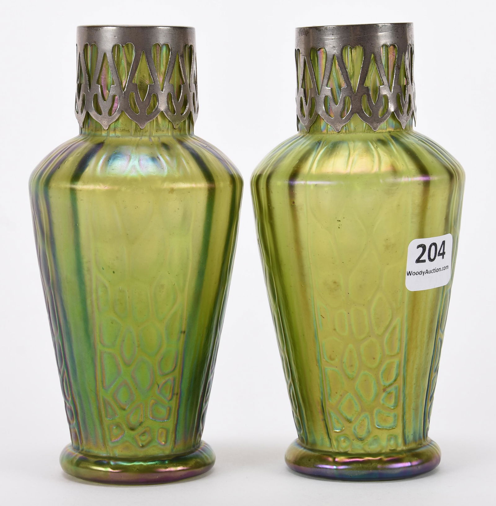 Pair green Loetz style art glass vases: Pair green Loetz style art glass vases; 6" Silverplate collar rims; Hopper Collection, Kansas