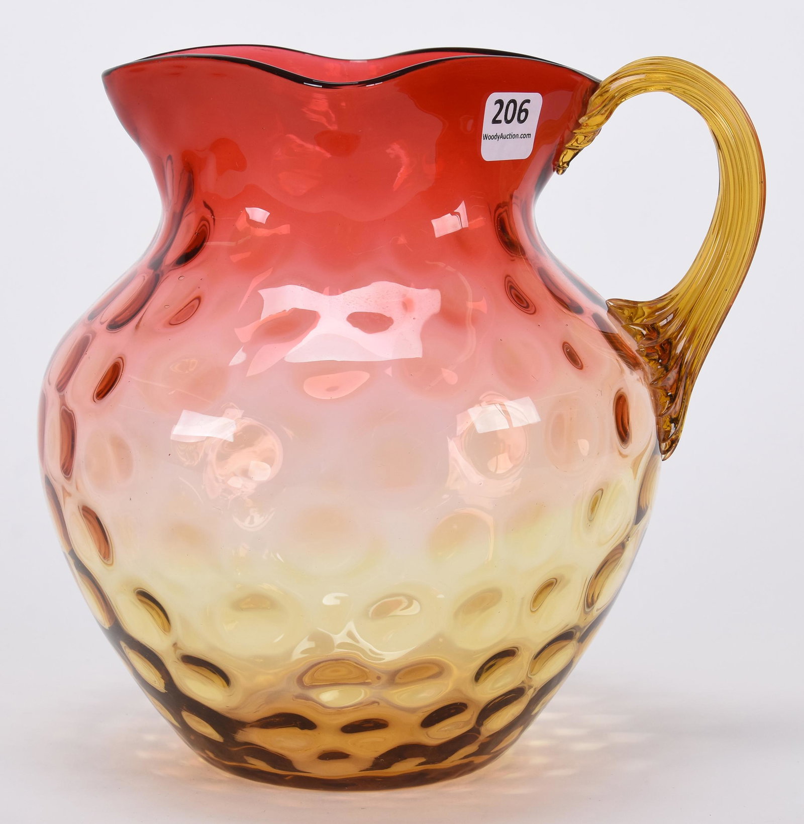 Water pitcher, amberina art glass coinspot: Water pitcher, amberina art glass coinspot; 7.5" Applied ribbed handle, polished pontil; Hopper Collection, Kansas
