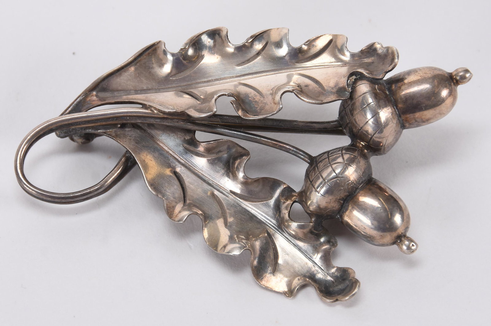 Sterling silver broach signed "Georg Jensen": Sterling silver brooch signed "Georg Jensen" 2.25" ; Acorn and leaf design ; Hopper Collection, Kansas