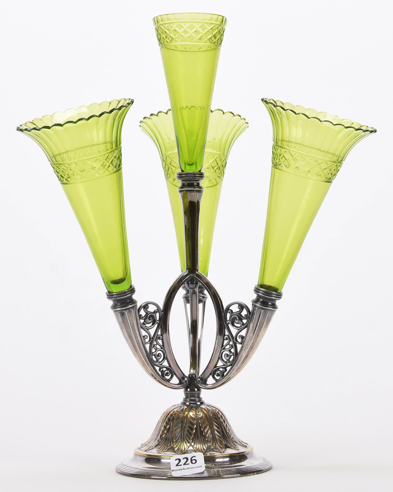 Epergne, four lily, art glass: Epergne, four lily, art glass; 12" x 9" (4) green cut glass trumpet vases set in original silverplate base; Hopper Collection, Kansas
