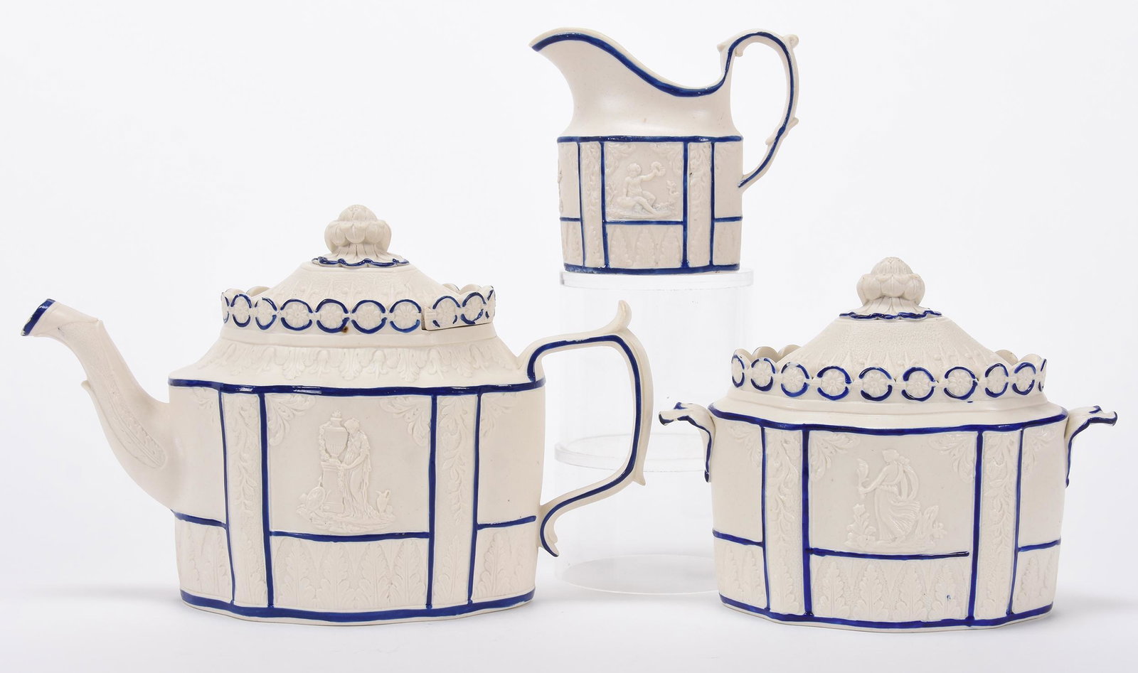 Three piece tea set, unmarked parian bisque: Three piece tea set, unmarked parian bisque; 6.5" x 10" Cobalt blue trim - teapot, creamer and sugar bowl, some slight damage; Hopper Collection, Kansas