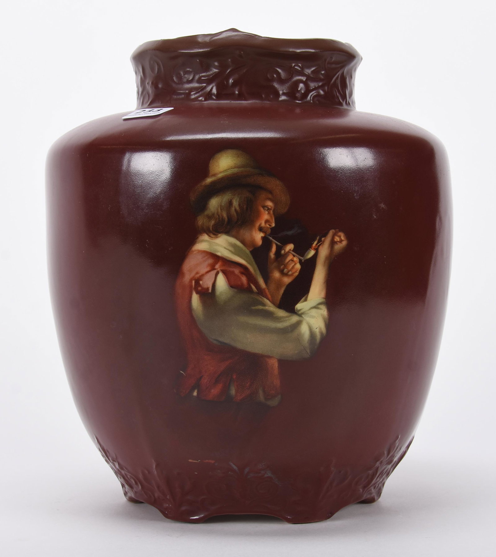 Vase marked Royal Bayreuth (blue mark): Vase marked Royal Bayreuth (blue mark); 9.5" x 8" Large, brown tones with pipe smoker decor, professional rim repair; Hopper Collection, Kansas