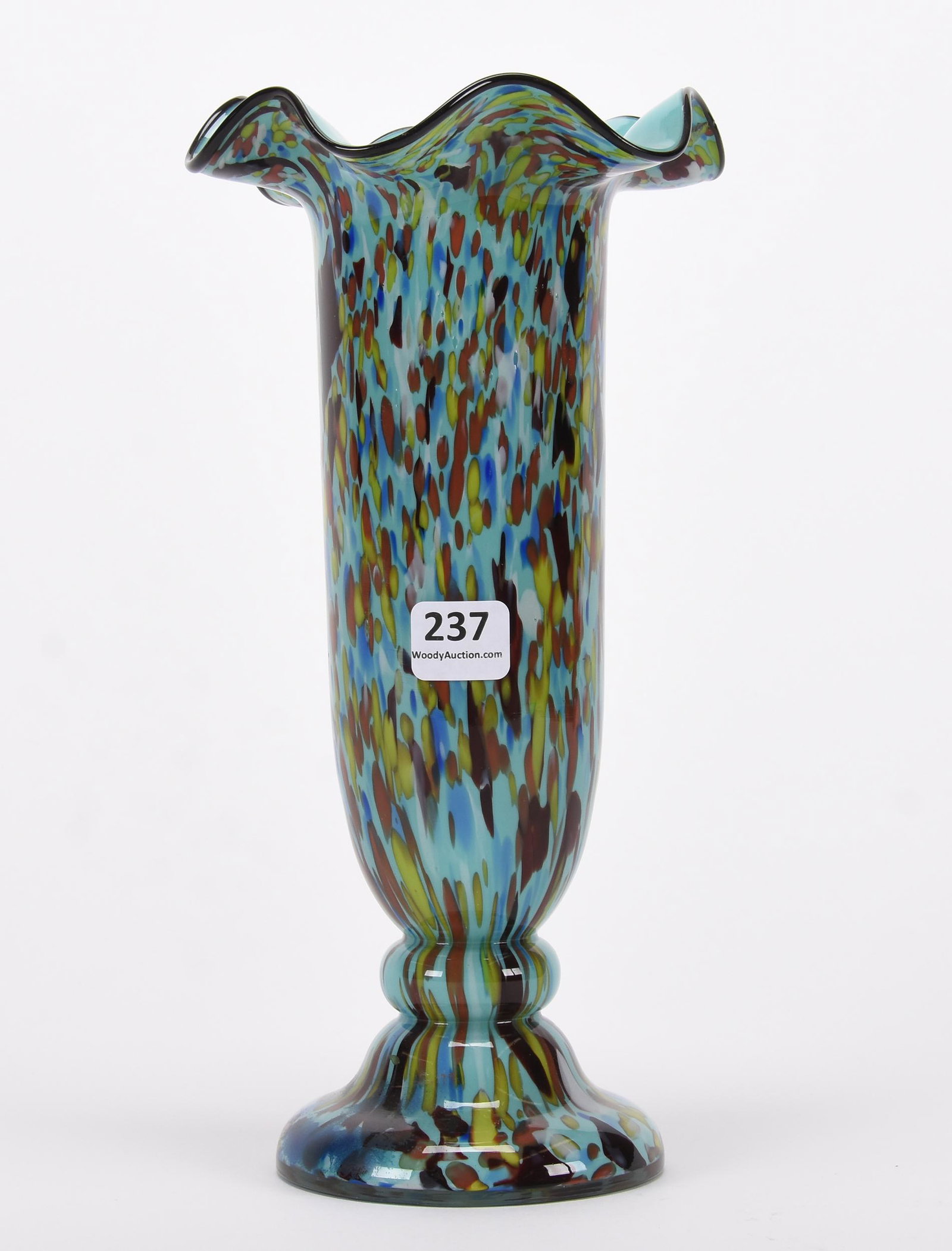 Pedestal vase, art glass: Pedestal vase, art glass; 9.75" Signed Czechoslovakia, green, blue, yellow and maroon mottled design, black trim; Hopper Collection, Kansas