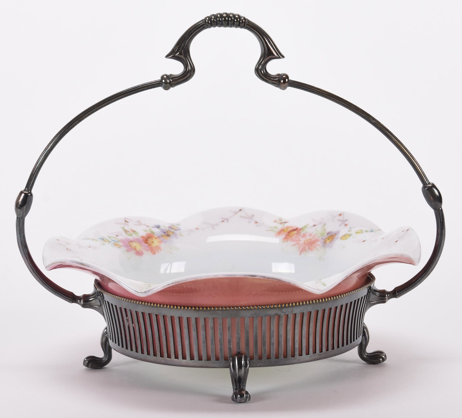 Brides basket: Brides basket; 8.5" x 10.25" Unmarked Mt. Washington decorated bowl set on original silverplate frame marked Pairpoint #4782; Hopper Collection, Kansas