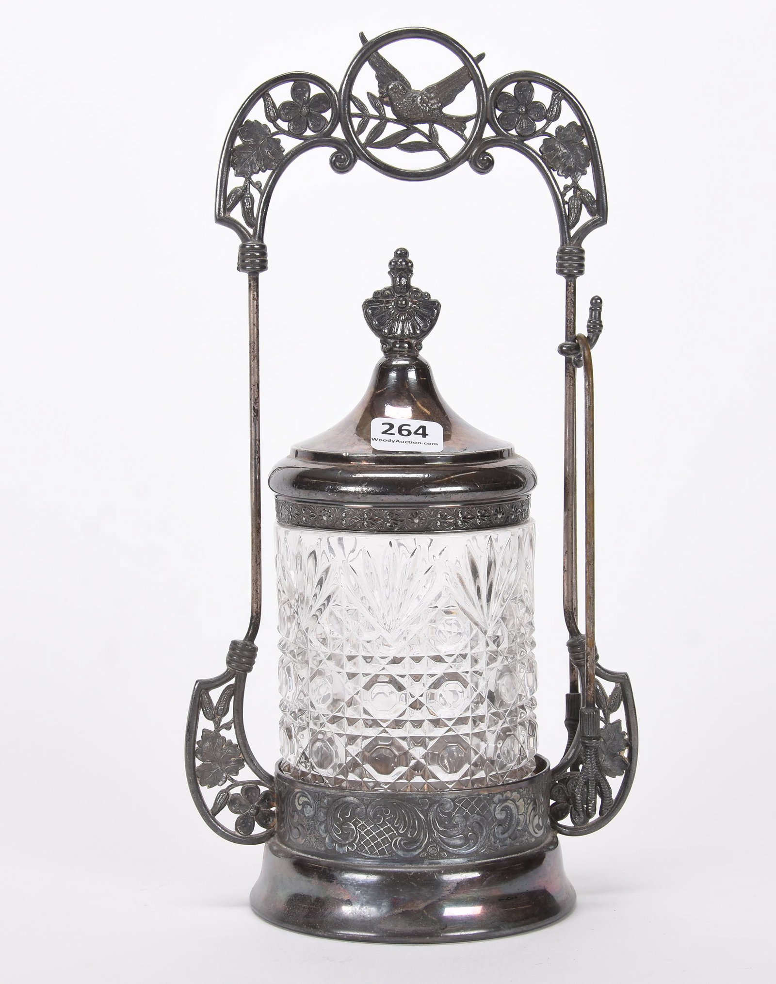 Pickle castor: Pickle castor; 11" Clear pressed glass insert with cane and fan motif, set on Rogers #479 silverplate frame; Hopper Collection, Kansas