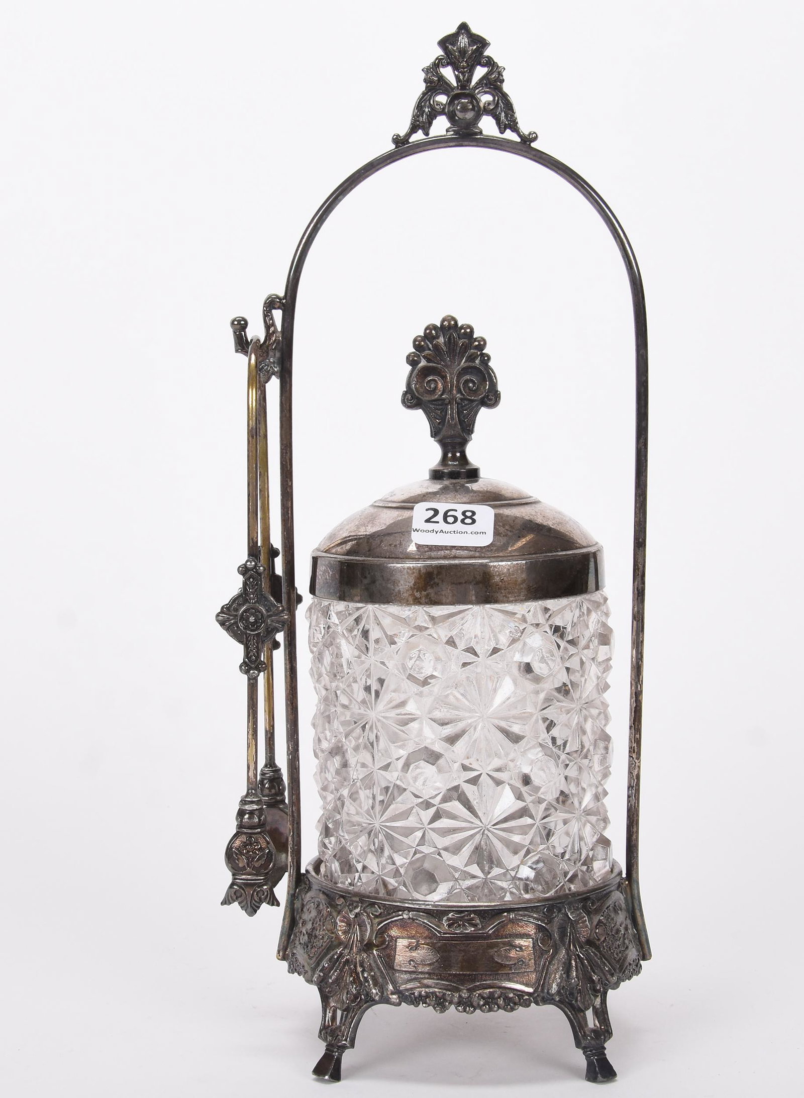Pickle castor: Pickle castor; 11.5" Clear pattern glass insert in button and daisy pattern, set on Tufts #2881 silverplate frame ; Hopper Collection, Kansas