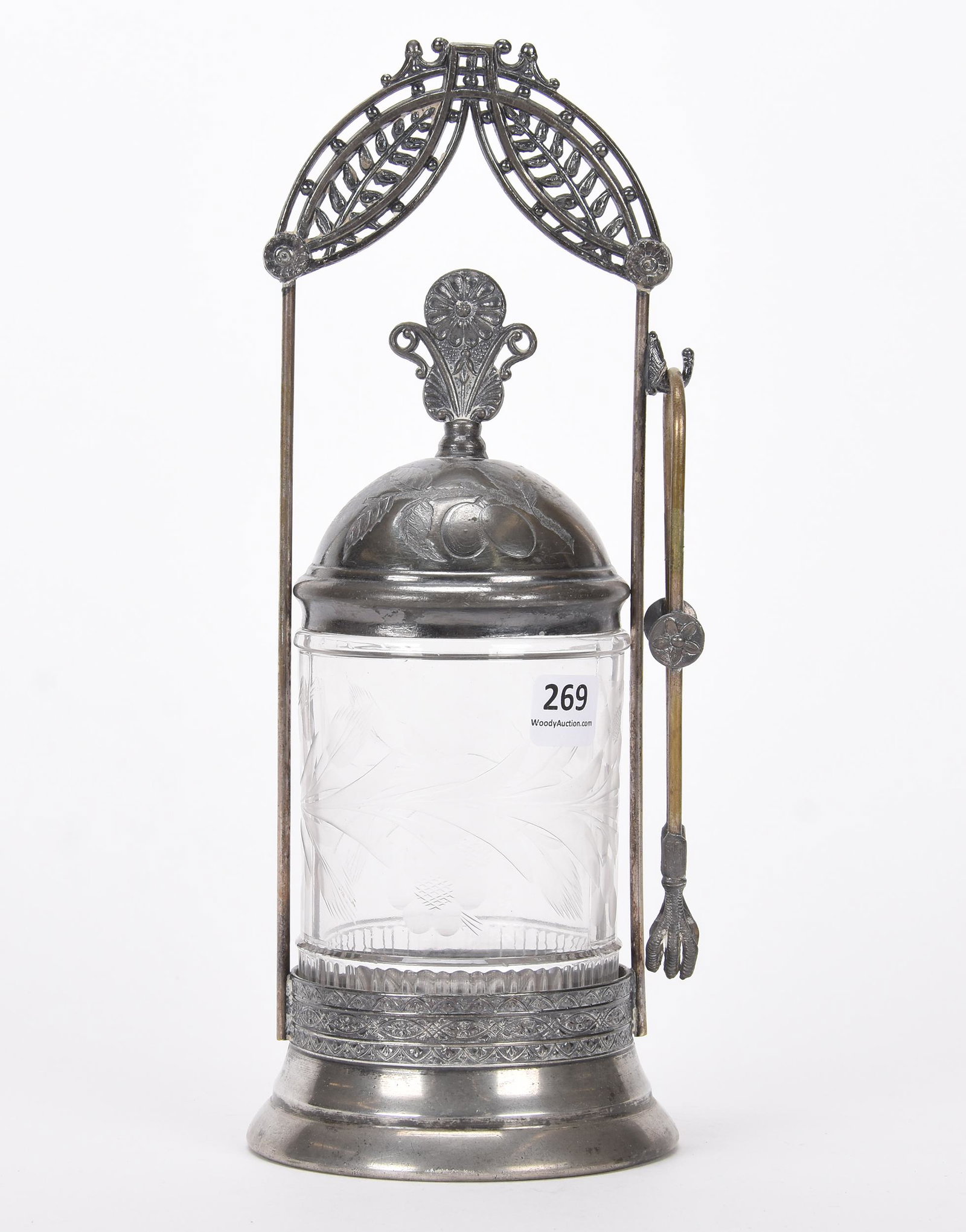 Pickle castor: Pickle castor; 11" Clear insert with engraved floral motif, set on Warner #02 silverplate frame, tiny nick on top ring of insert ; Hopper Collection, Kansas