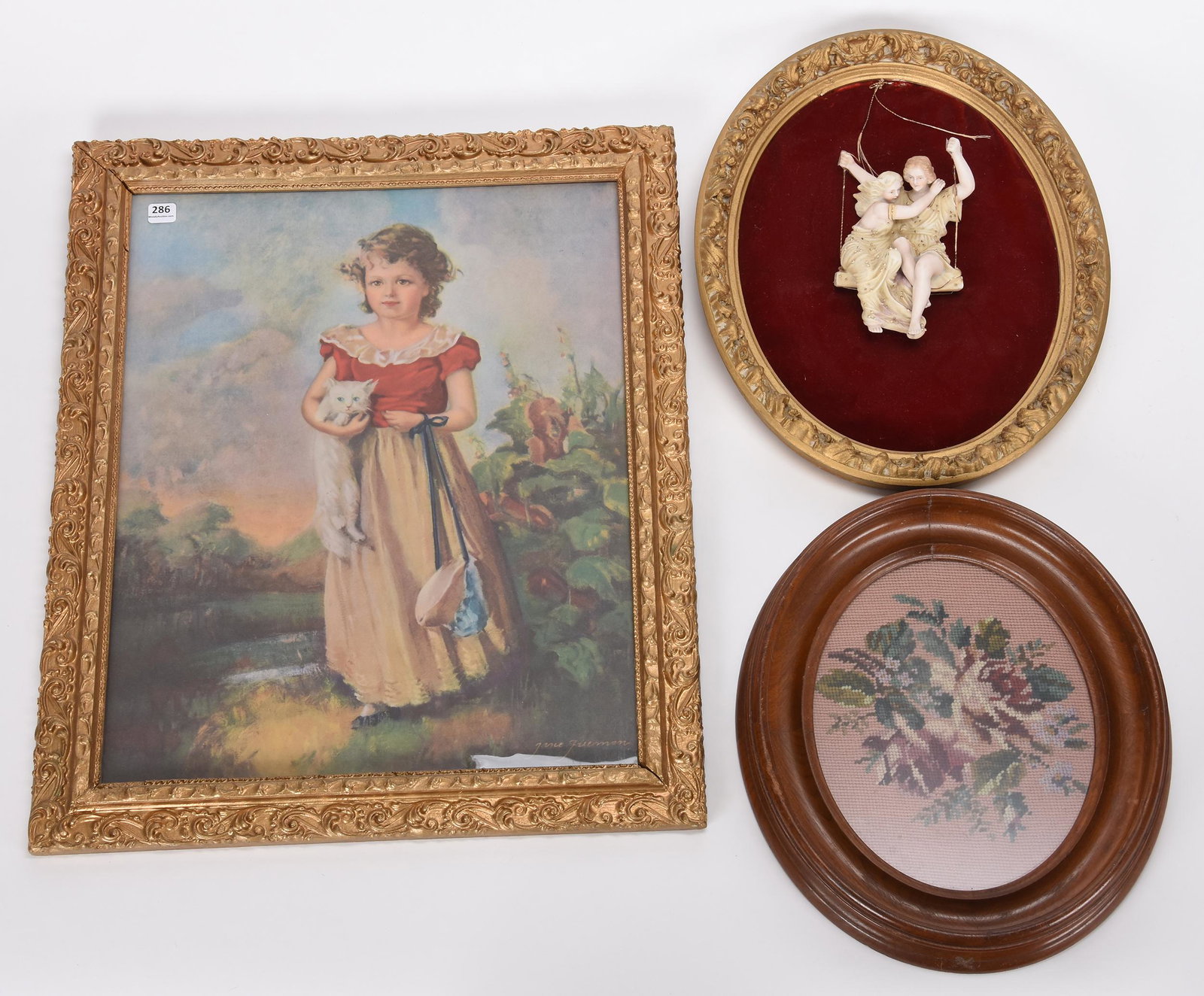 Framed pictures: Framed pictures; 23.5", 16", 14" (1) 23.5" framed print by Freeman; (1) 16" oval frame featuring three-dimensional bisque swinging couple; (1) 14" oval walnut frame with needlepoint flowers; Hopper Co