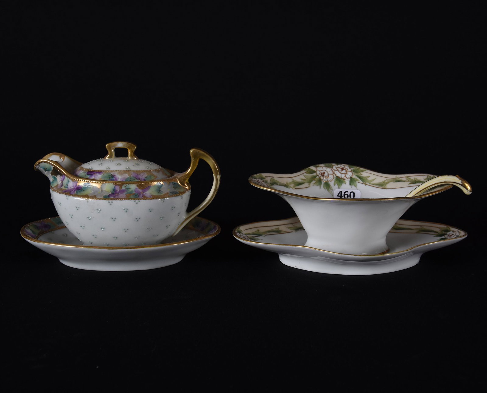 (2) Service items with underplates marked Nippon: (2) Service items with underplates marked Nippon; (1) 3.75" x 6" gravy boat, white with floral border & green beaded tapestry highlights; (1) 2.75" x 7.25" mayonnaise with ladle, white with cream bord