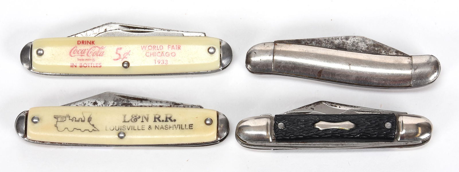 (4) Vintage pocket knives: (4) Vintage pocket knives; (1) 1933 Chicago World's Fair Coca-Cola advertising; (1) L & N Railroad advertising; (1) Silver/nickel color, unknown maker; (1) Made by Ideal - blades approximately 2" - mu
