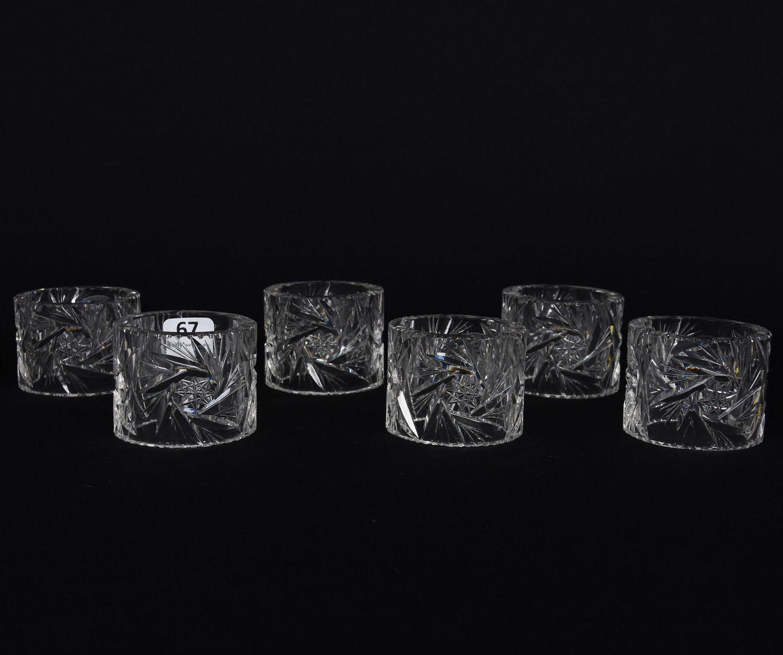 (6) Napkin Rings, American Brilliant Cut Glass: (6) Napkin Rings, American Brilliant Cut Glass; 2.25" x 1.75" Pinwheel, Strawberry Diamond and Fan Motif; Goodrich Collection, New York