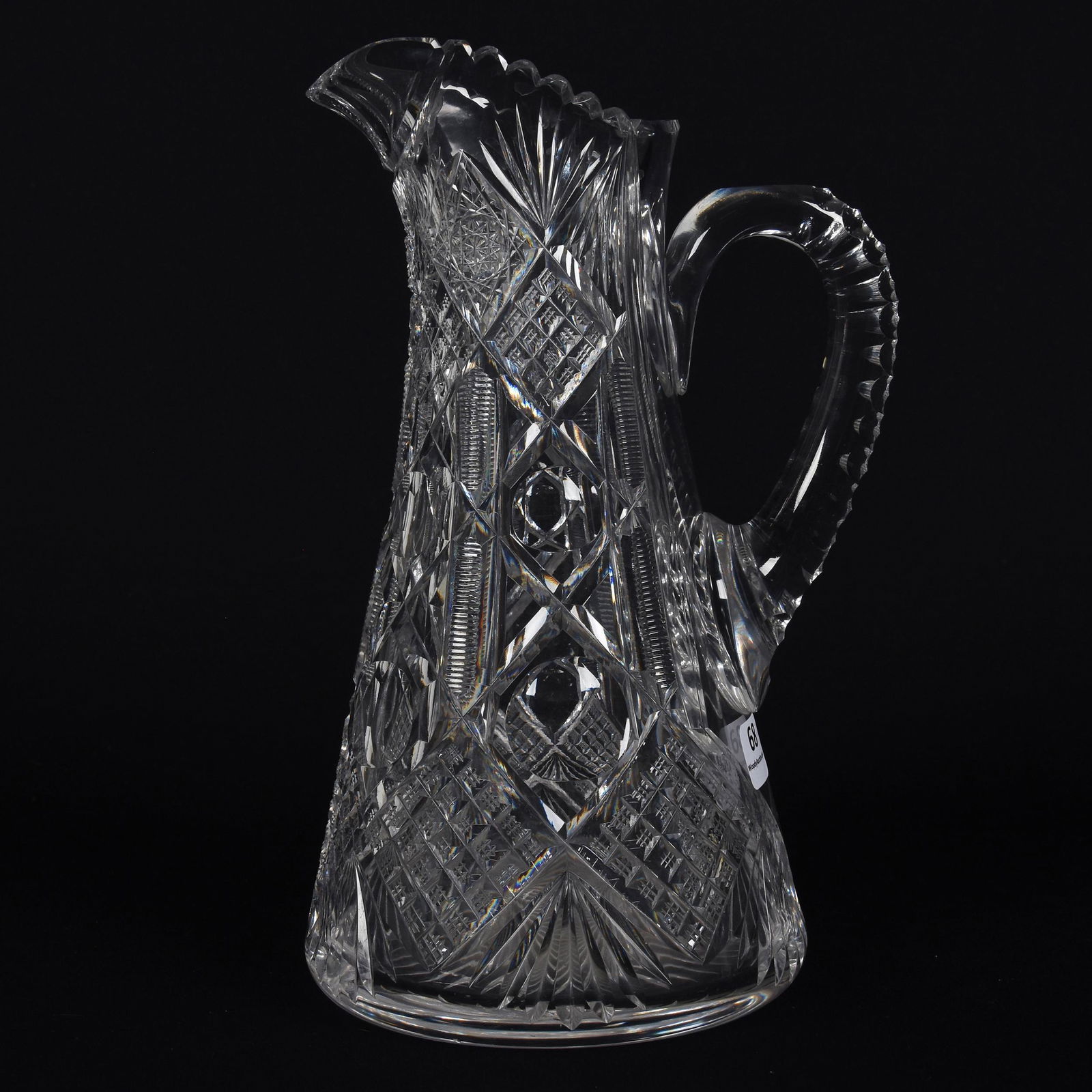 Water Pitcher, American Brilliant Cut Glass: Water Pitcher, American Brilliant Cut Glass; 10" Chester Pattern by Ideal Cut Glass, Pattern Resembles Hawkes Navarre, Triple Notched Handle, Ray Cut Base; Goodrich Collection, New York