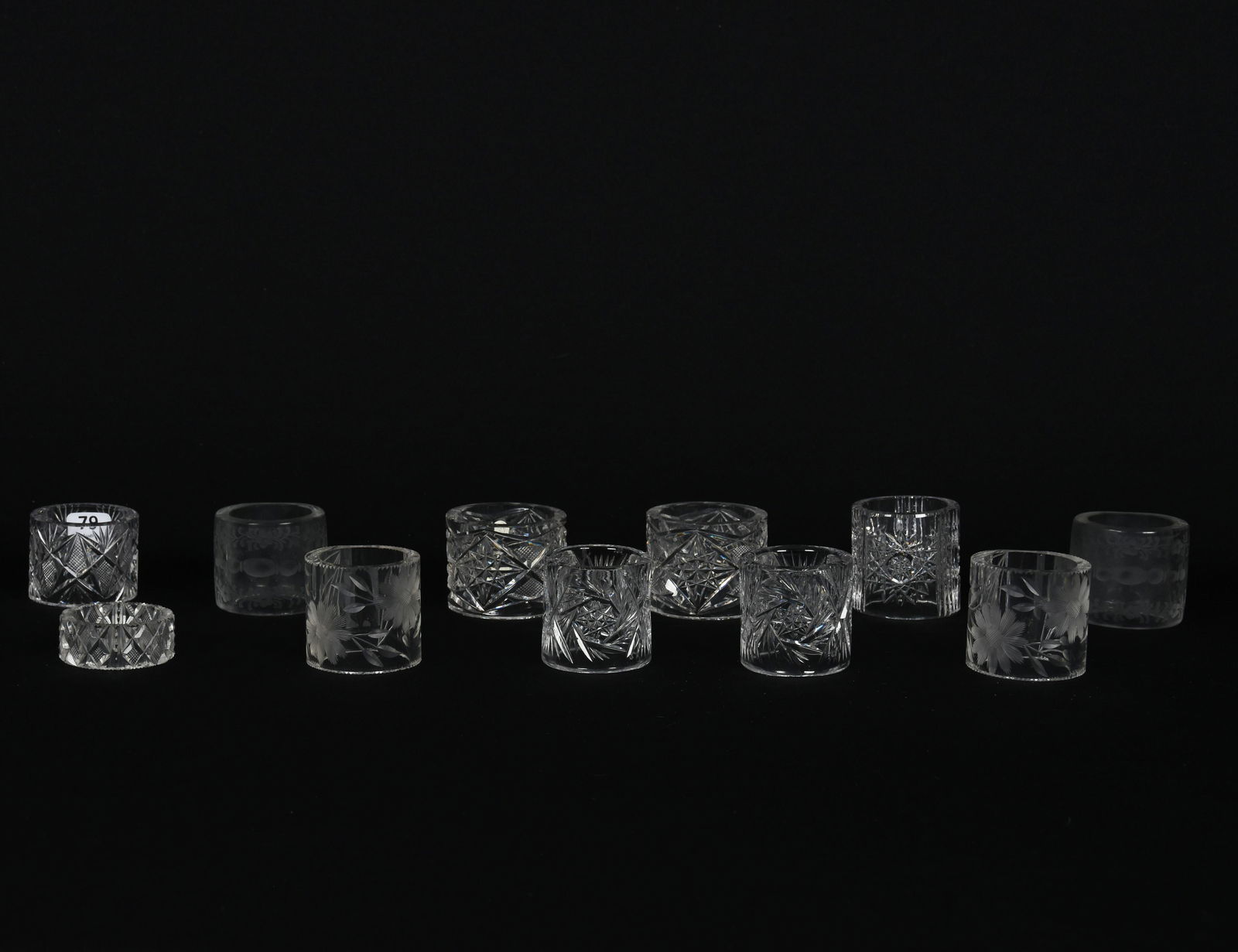 (11) Napkin Rings, American Brilliant Cut Glass: (11) Napkin Rings, American Brilliant Cut Glass; (7) Geometric Cut, Various Sizes; (4) Engraved Floral - Total of (4) Matching Pairs; Goodrich Collection, New York