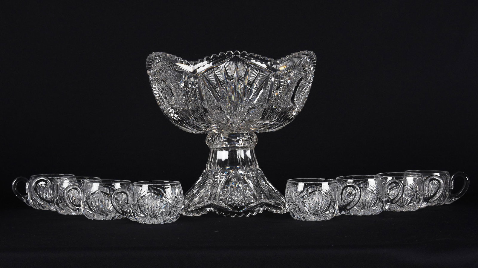 Egg Nog Bowl, American Brilliant Cut Glass: Egg Nog Bowl, American Brilliant Cut Glass; 9" x 10" Hobstar, Vesica, Cane, Prism and Notched Fan Motif; (8) Matching Cups, This Pattern Has Previously Been Known As "Bolo", Unable to Locate Reference