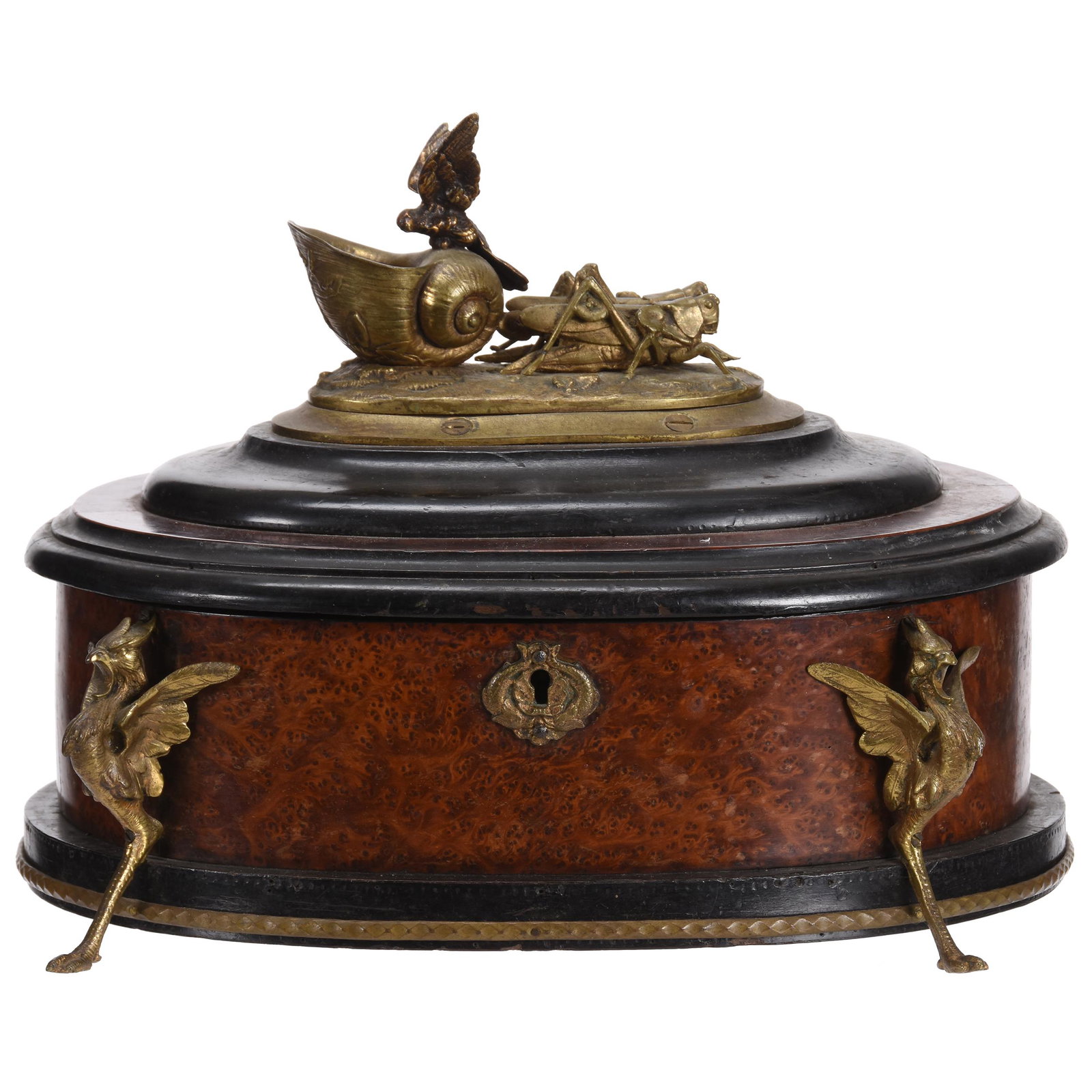 Early Lock Chest, Mythical Figures: Early Lock Chest, Mythical Figures; 9" x 12.5" Ebony and Burl Veneer Box in Oval Form with Finely Crafted Gilt Metal Finial Featuring Two Grasshoppers Pulling Snail Shell Chariot with Bird, Box Has Fo