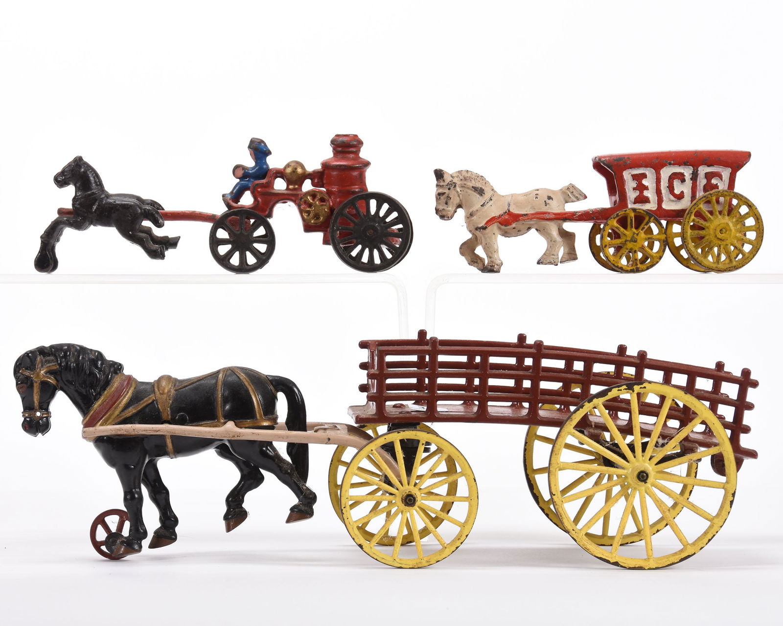 (3) Cast Iron Horse Drawn Toys: (3) Cast Iron Horse Drawn Toys; (1) 5" X 16" Horse and Wagon, (1) 3" X 9" Fire Engine, (1) 3" X 7.5" Ice Wagon - Age Unknown; Balliet Collection, Mississippi. UPDATED 2-13-20: There is a crack on the