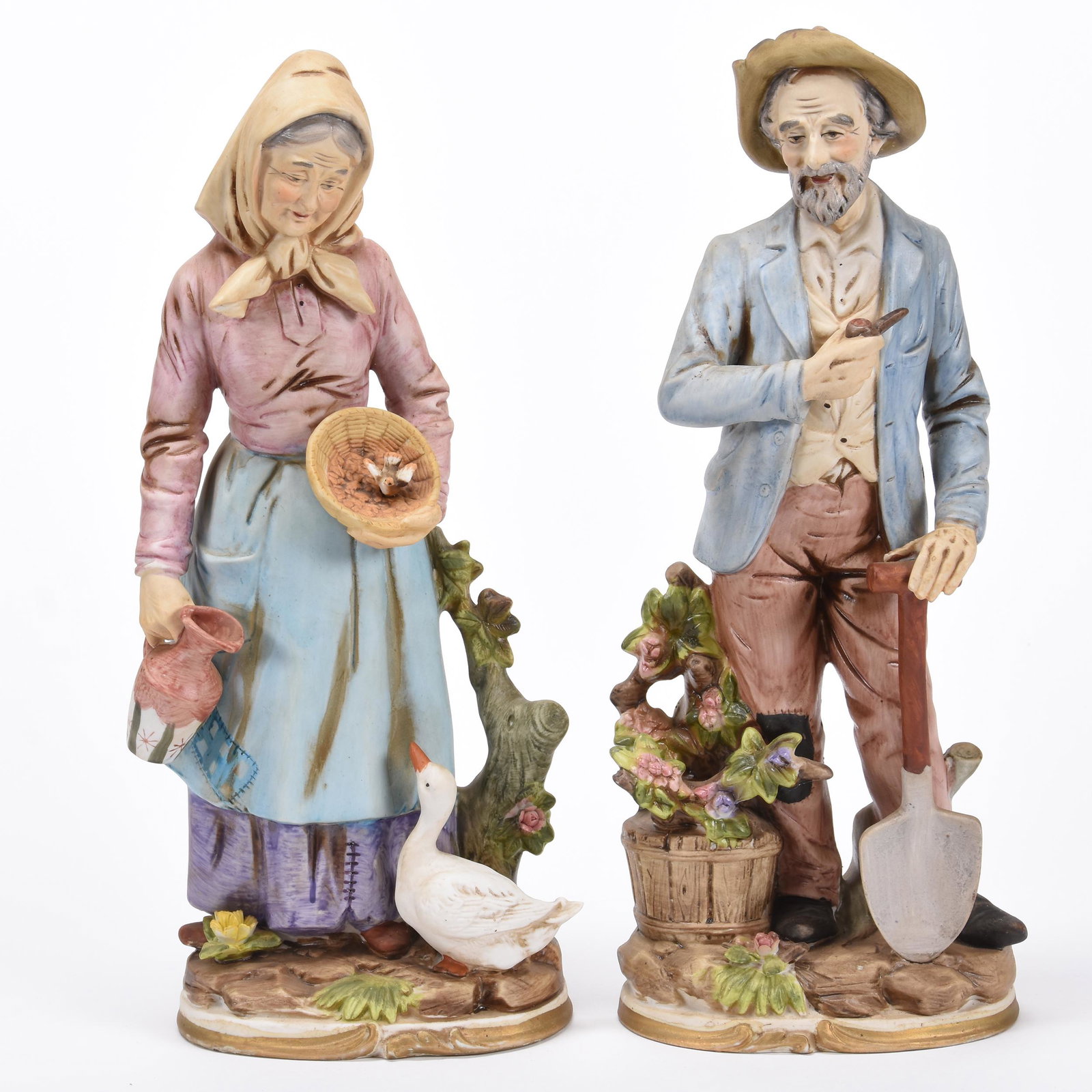 Modern Bisque Figurines: Modern Bisque Figurines; 13.5" (1) Farmer with Shovel, (1) Woman Feeding Goose; Balliet Collection, Mississippi