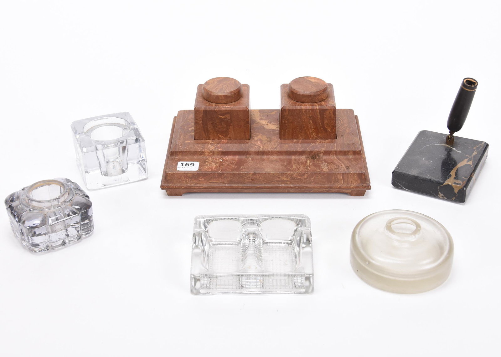 (6) Assorted Inkwell & Desk Set Items: (6) Assorted Inkwell & Desk Set Items; (3) Clear Inkwells Without Lids, (1) Double Finger Moistener, Base Chip, (1) Pen Holder, (1) Unusual Double Inkwell Made from Unknown Material Resembling Wood, S
