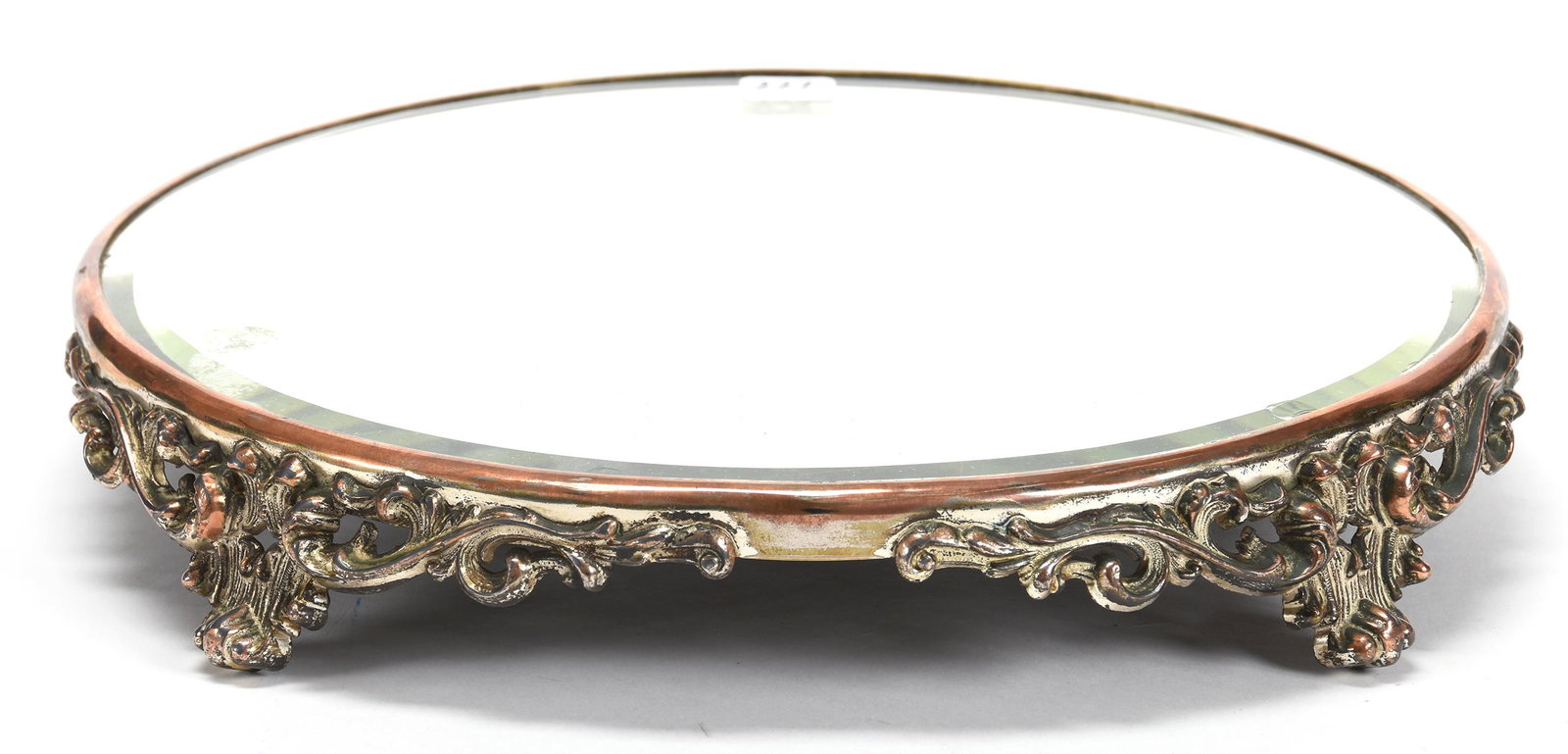 Beveled Mirror Plateau: Beveled Mirror Plateau; 2" X 12"; Scroll Mold Frame with Worn Plating Showing Copper and Silver, Two Small Surface Chips on Edge of Mirror; Blattner Collection, Montana