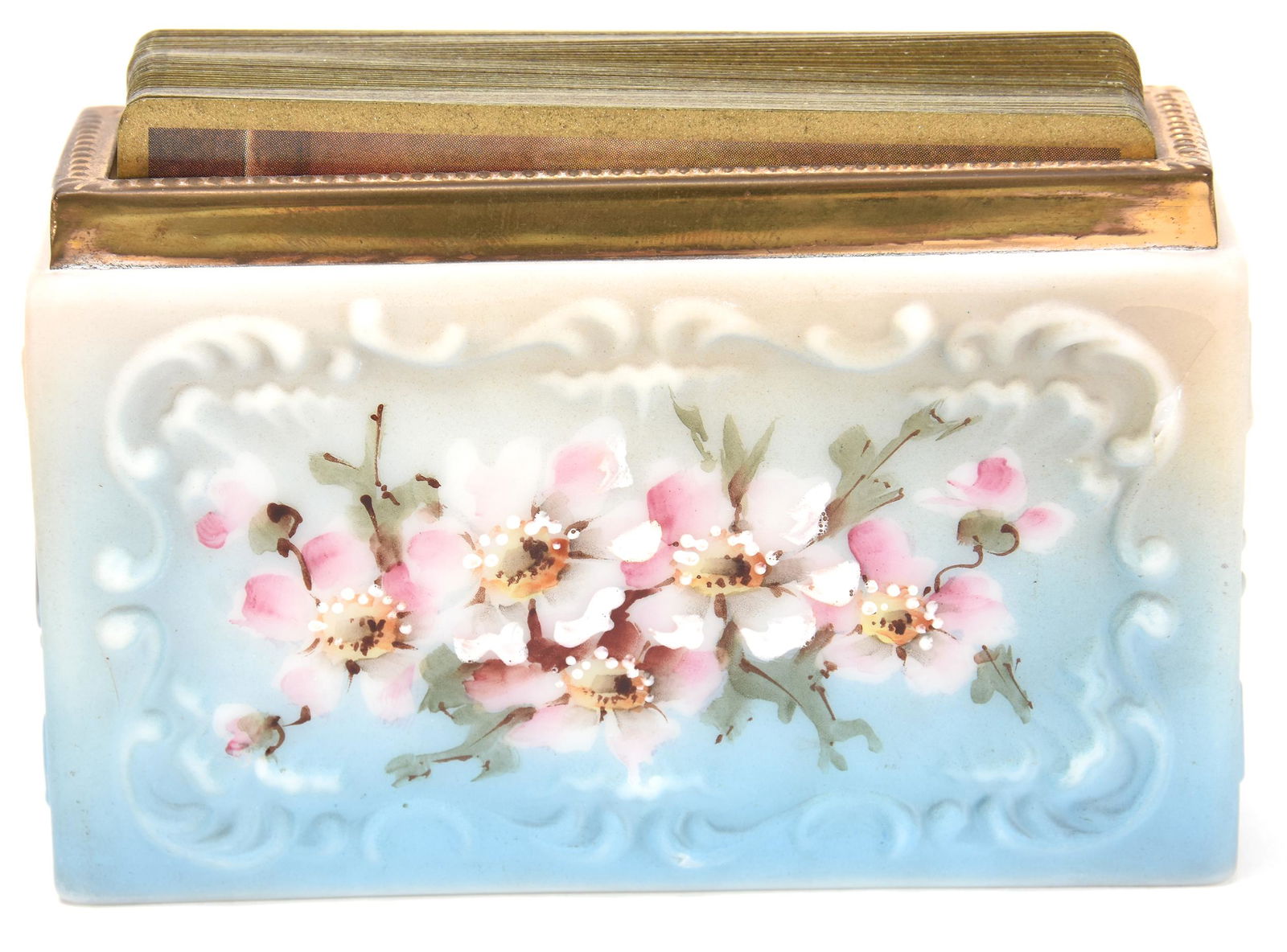 Playing Card Holder Marked Nakara: Playing Card Holder Marked Nakara; 2.5" X 4.25" Blue and Cream Tones with Pink Floral Decor, Scroll Mold, Gilt Metal Rim, Sells with Set of Playing Cards; Newland Collection, California