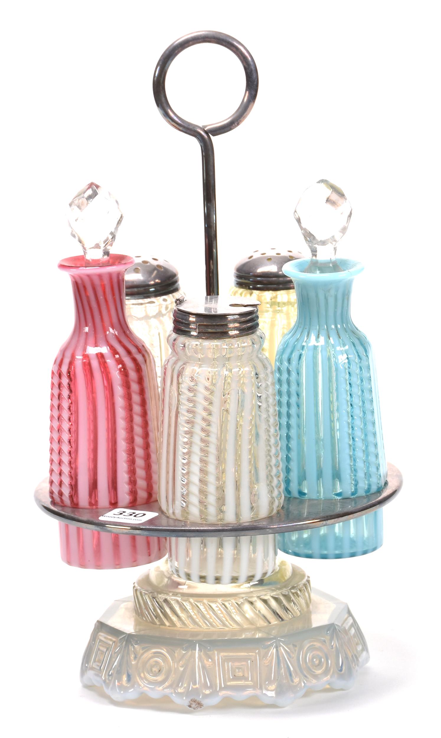 Castor Set, All Glass: Castor Set, All Glass; 11.5" X 6.5" (5) Pattern Glass Opalescent Striped Bottles Including (2) Clear, (1) Yellow, (1) Cranberry, (1) Blue (Bottle Cracked), Set on An Opalescent Glass Base, Very Rare;