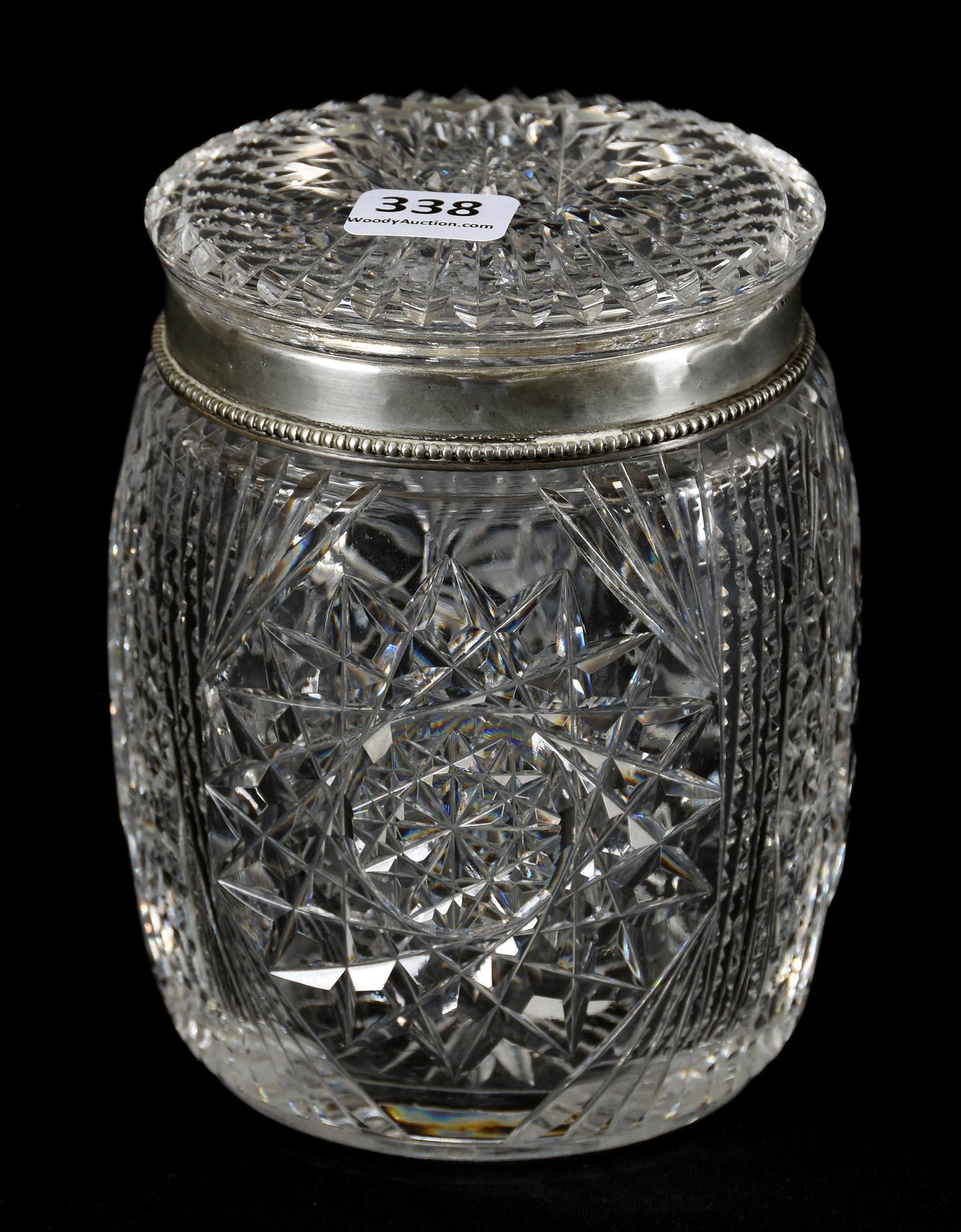 Cigar Jar, American Brilliant Cut Glass: Cigar Jar, American Brilliant Cut Glass; 5.5" X 4" Hobstar and Prism Motif, Sterling Silver Rim by C.F. Monroe, Glass Lid, Sizeable Interior Rim Chip on Lid; Newland Collection, California. UPDATED 2-