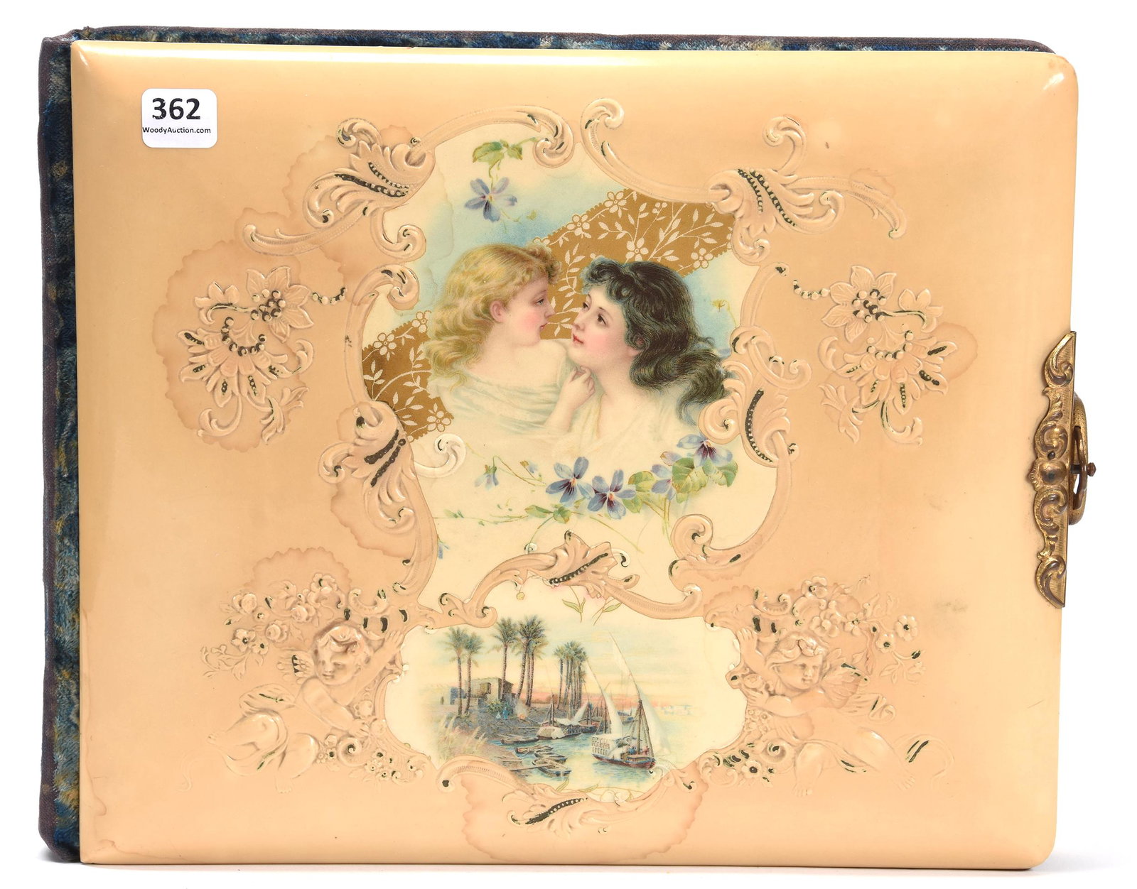 Celluloid Victorian Photo Album: Celluloid Victorian Photo Album; 10" X 12.5" Cream Background with Woman and Child, Middle Eastern Sailboat Scene, Some Light Staining on Front; Newland Collection, California