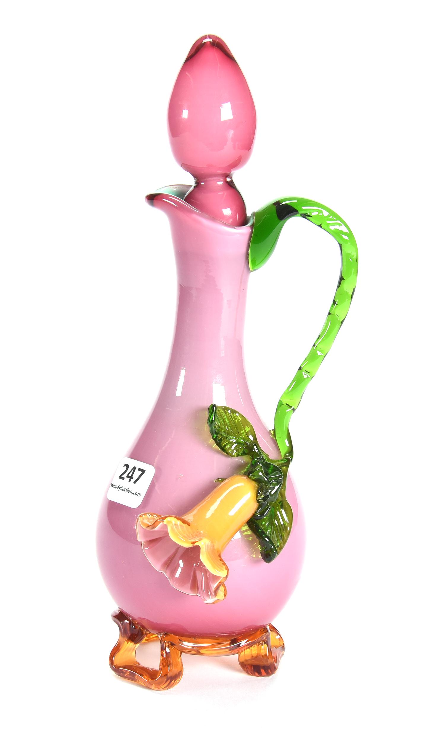 Cruet, Attributed To Stevens & Williams Art Glass: Cruet, Attributed To Stevens & Williams Art Glass, 9.5", Plum Color Body With Applied Green Handle And Yellow Morning Glory Blossom, Amber Applied Feet, Original Stopper, Circa 1900's; Private Collect