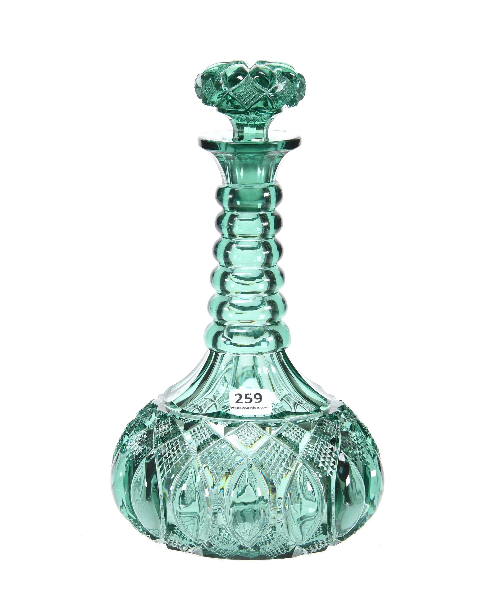 Decanter, BPCG, Solid Emerald Green Cased: Decanter, BPCG, Solid Emerald Green Cased, 10.5", Strawberry Diamond And Tusk Motif, Pattern Cut Stopper, Six Bulging Rings On Neck, Ray Cut Base, Many Motifs Are Reminiscent Of New England Glass Comp