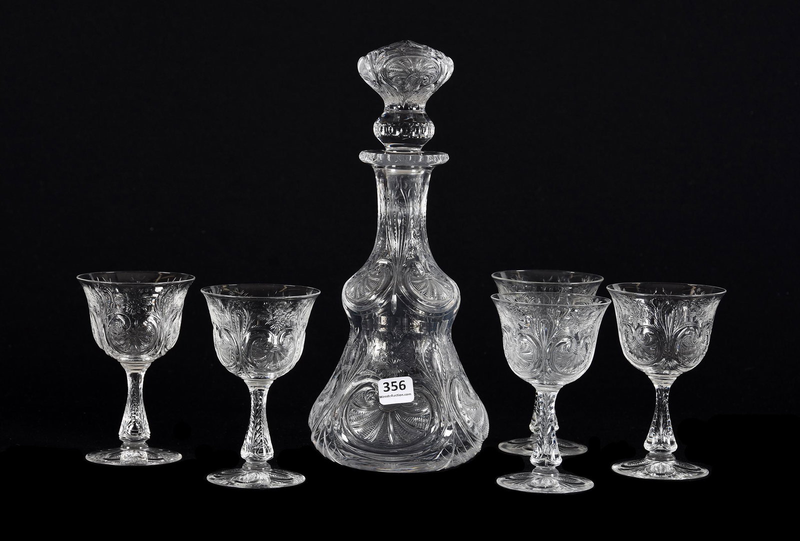 Decanter Set, Rock Crystal, BPCG, Attributed To Webb: Decanter Set, Rock Crystal, BPCG, Attributed To Webb, 11", 4.75", Engraved Floral And Rococo Design, Pattern Cut Stopper And Base, (4) Pattern Matched Wine Stems, Fifth Wine Has A Small Base Chip, Pri