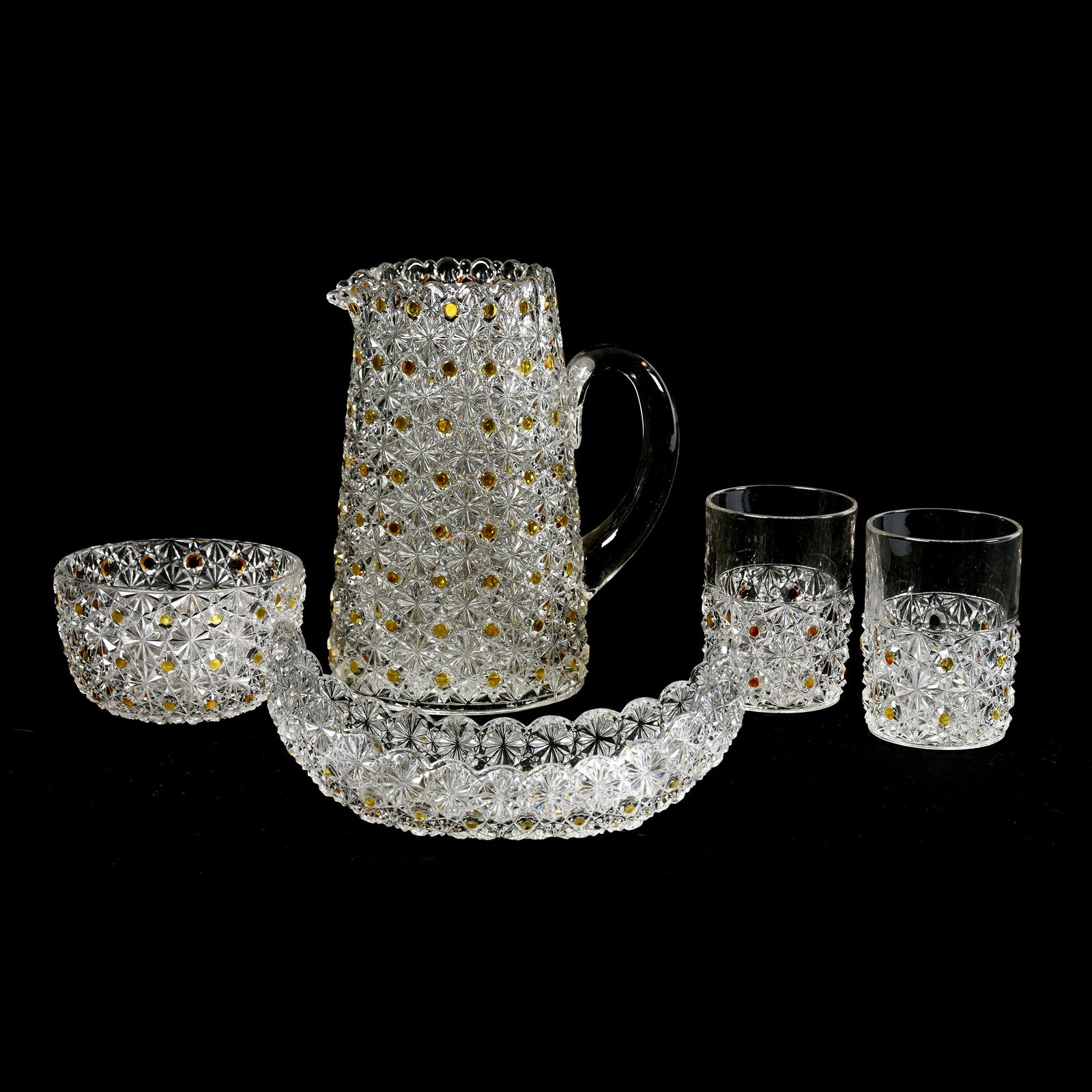 (5) Piece Button & Daisy Set, Clear W/Amber Buttons: (5) Piece Button & Daisy Set, Clear with Amber Buttons, Includes 8.5" Water Pitcher (Annealing Crack on Handle), (2) Tumblers (One Ground Down on Base), (1) 8" Canoe Shaped Relish, (1) Finger Bowl, Ro