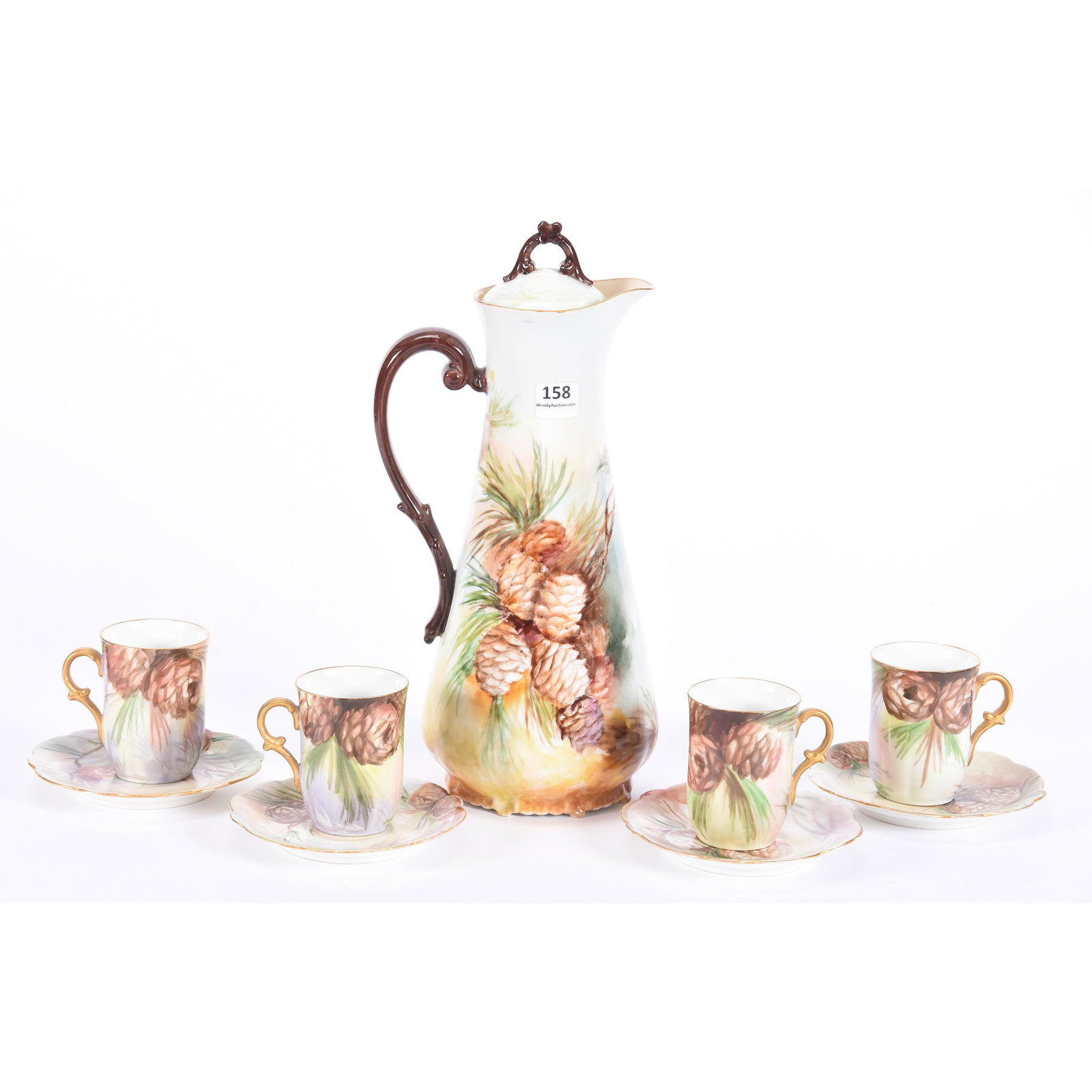 Chocolate Set Marked T&V Limoges: Chocolate Set Marked T&V Limoges, 12", Hand Painted Pinecone Scenic Decor, Selling with (4) Matching Cups and Saucers, Bottom of One Foot on Chocolate Pot has Small Chip, Rim Chip on One Cup, Dean and