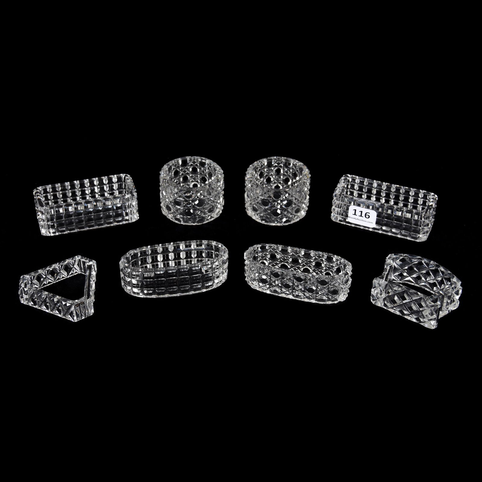 (8) Assorted Napkin Rings, ABCG: (8) Assorted Napkin Rings, ABCG, (2) 2" Round in Cane Pattern, (2) 3" Rectangular Block Pattern, (1) 3" Oval Block Pattern, (1) 3" Oval Cane Pattern, (1) Triangular Diamond Pattern, (1) Loaf Shape in
