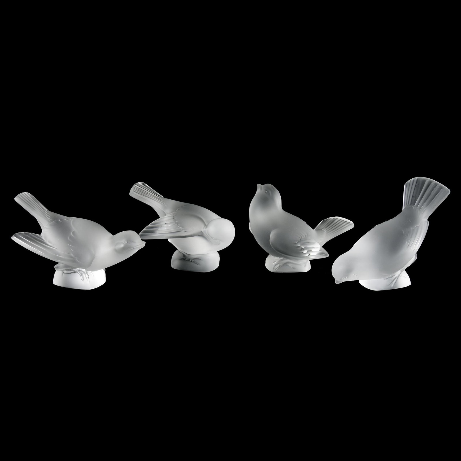 (4) Figures Signed Lalique France, Birds: (4) Figures Signed Lalique France, Birds, (1) 4" Head Down, (1) 3.5" Head Up, (1) 3.25" Head Under Wing, (1) 3.25" Wings Out - Script Signatures, from the estate of Ronald W. Prielipp PHD, Salina, KS.