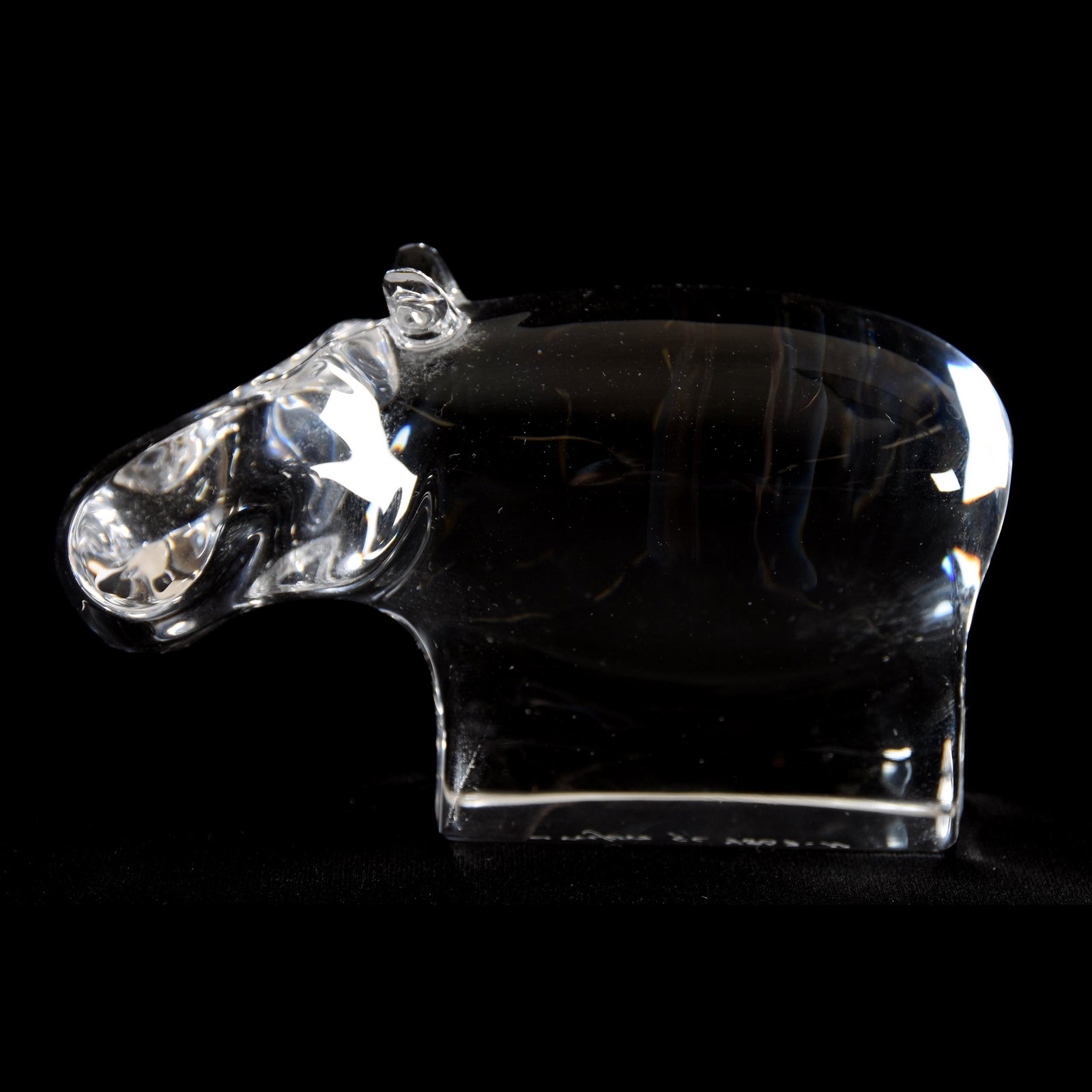 Crystal Hippo Figure Signed Orrefors: Crystal Hippopotamus Figure Signed Orrefors, 2.75" x 4.5", from the estate of Ronald W. Prielipp PHD, Salina, KS. Ron was a professor of mathematics at Bethany College, Lindsborg, KS. Ron and his wife