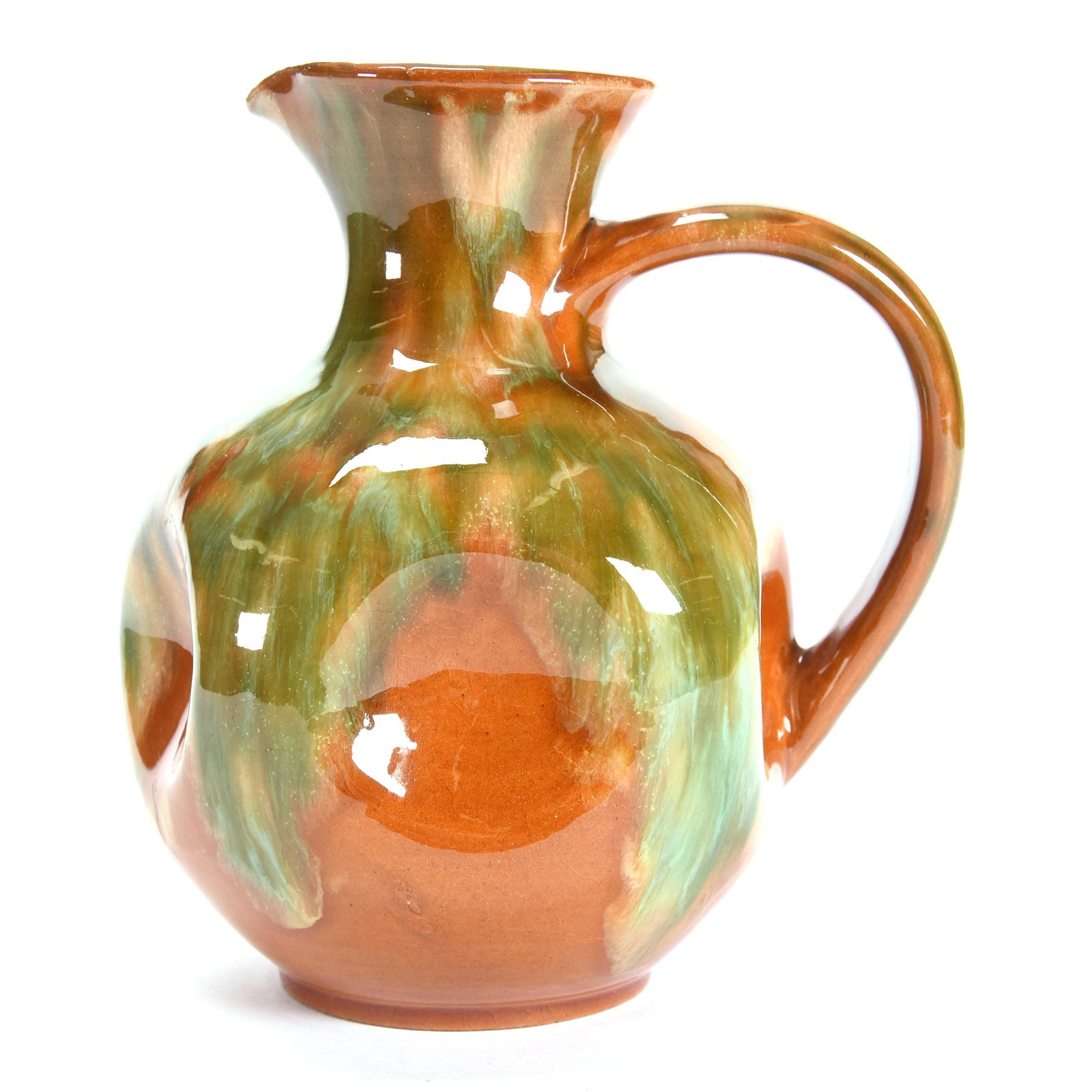 Art Pottery Pitcher Signed Anton Lang (1875-1938): Art Pottery Pitcher Signed Anton Lang (1875-1938), 6.5" x 6", Brown and Green Glaze Finish, Five Dimpled Sides, Interior Rim Spout Chip, Anton Lang was also an Artist for Rookwood Pottery, from the es