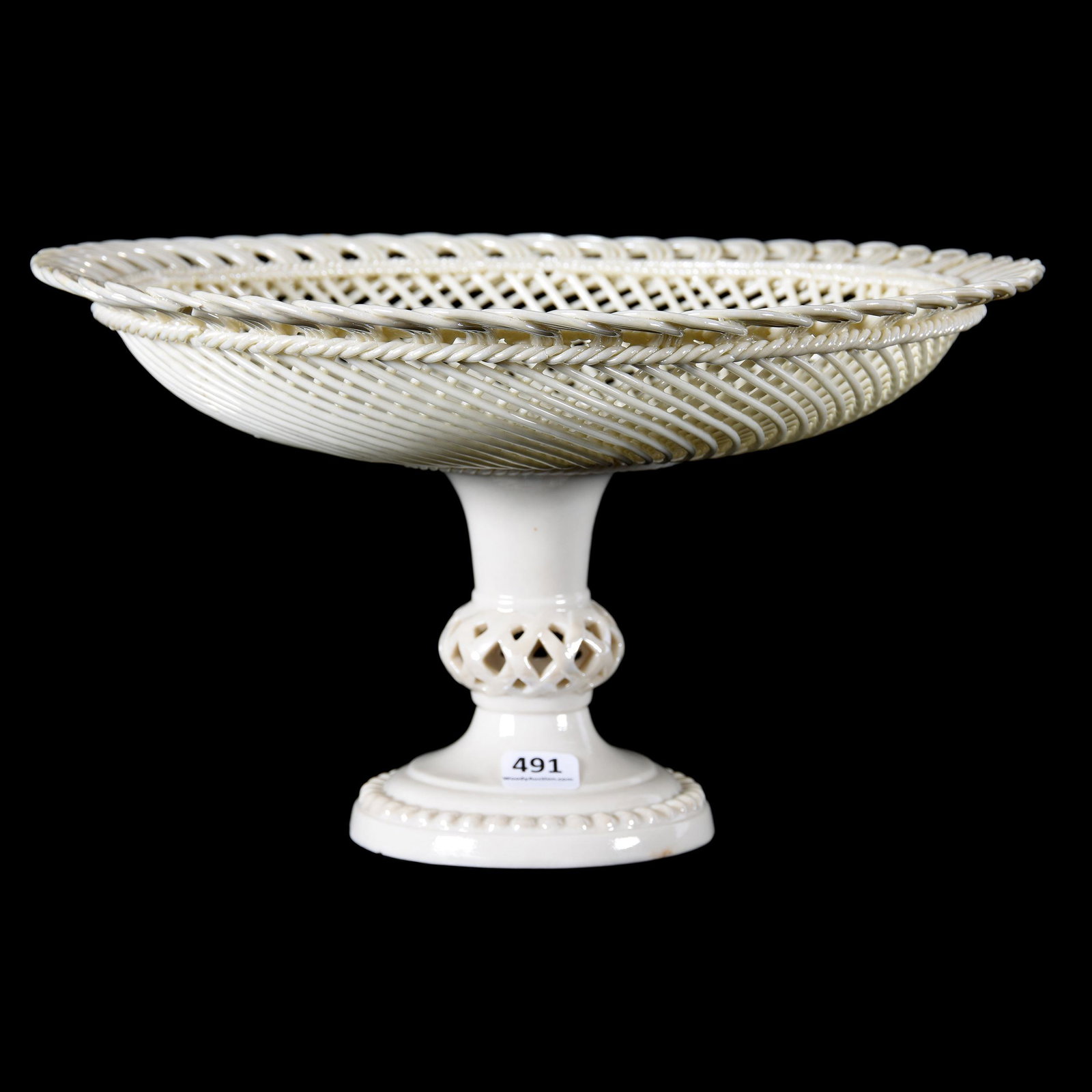 Woven Basket Comport, Irish Belleek Black Mark: Woven Basket Comport, Irish Belleek Black Mark, 6.5" x 11.5", Beautiful Lattice Design, Pierced Lattice Stem, Edge has some Hard to See Cracks & Loss on Underside, from the estate of Ronald W. Prielip
