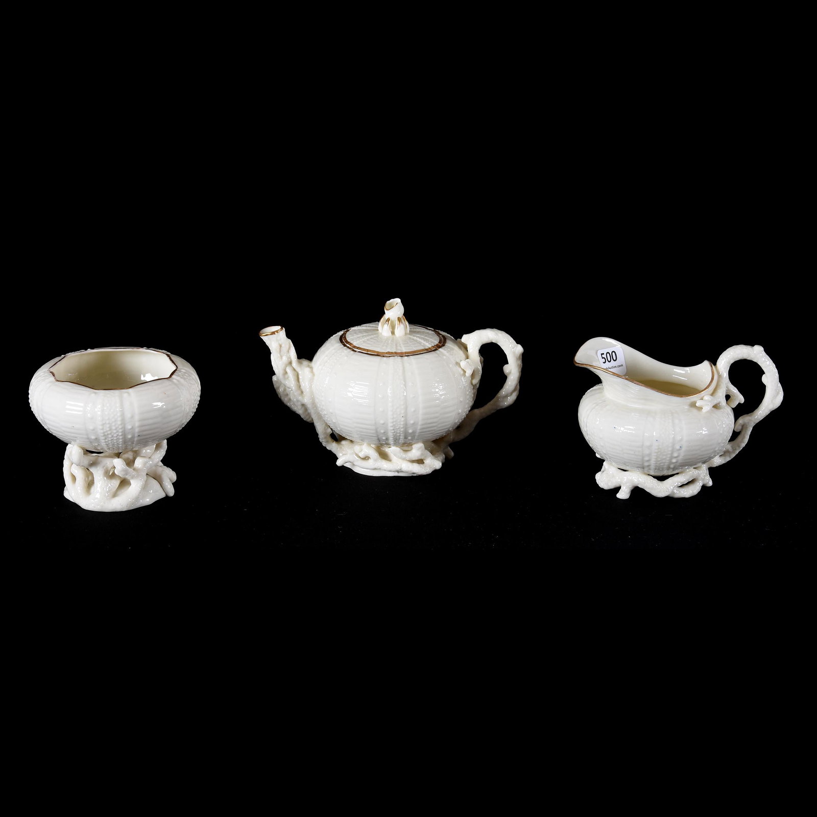 Tea Set, Irish Belleek Black Mark, Echinus Pattern: Tea Set, Irish Belleek Black Mark, Echinus Pattern, Gilded Highlights - (1) 4.25" x 6.25" Teapot, Lid is Cracked, Finial Chipped, (1) 3.5" Creamer, (1) 3" Open Sugar, from the estate of Ronald W. Prie