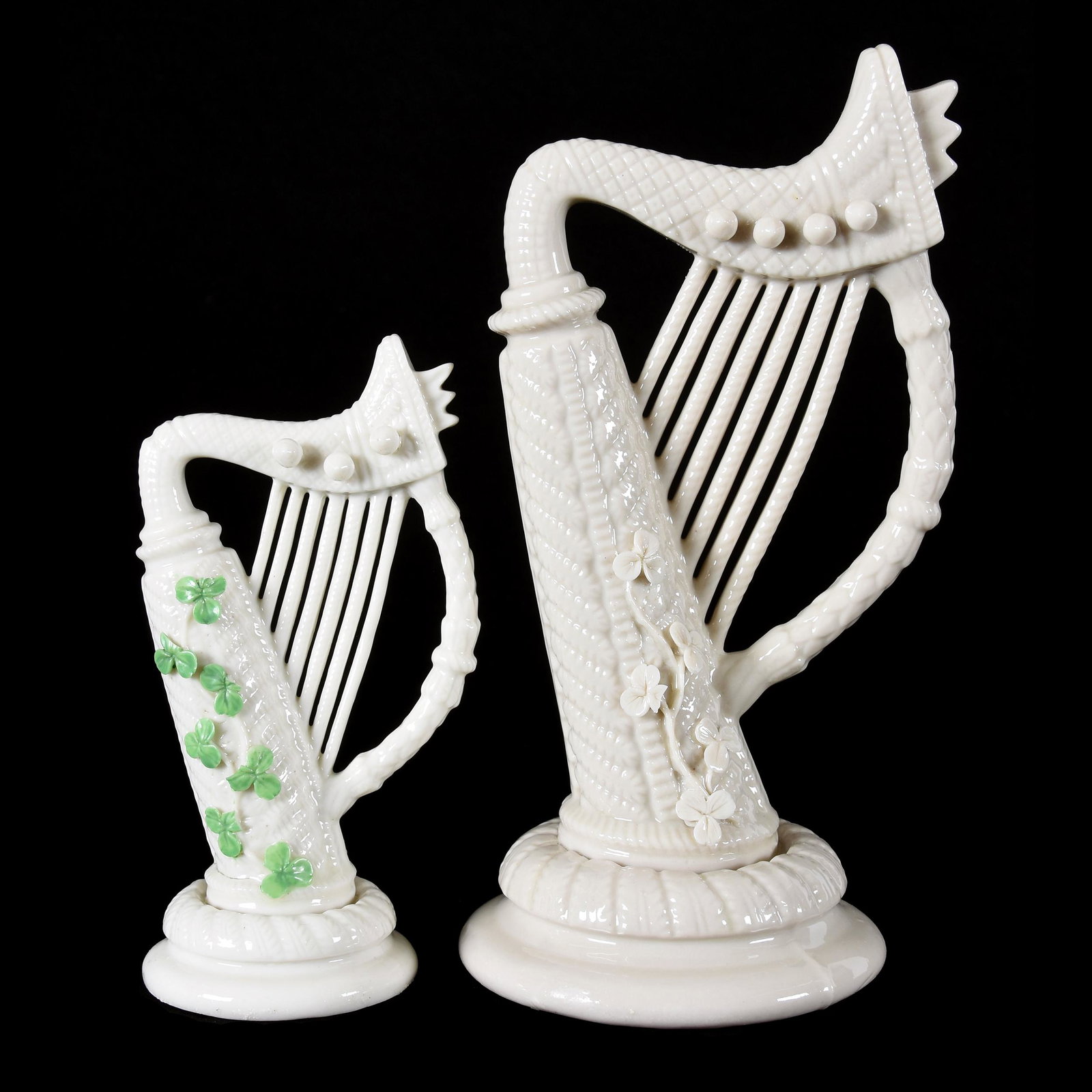 (2) Harp Figures, Irish Belleek Black Mark: (2) Harp Figures, Irish Belleek Black Mark, (1) 8.5", (1) 6", Green Shamrock Highlights, from the estate of Ronald W. Prielipp PHD, Salina, KS. Ron was a professor of mathematics at Bethany College, L