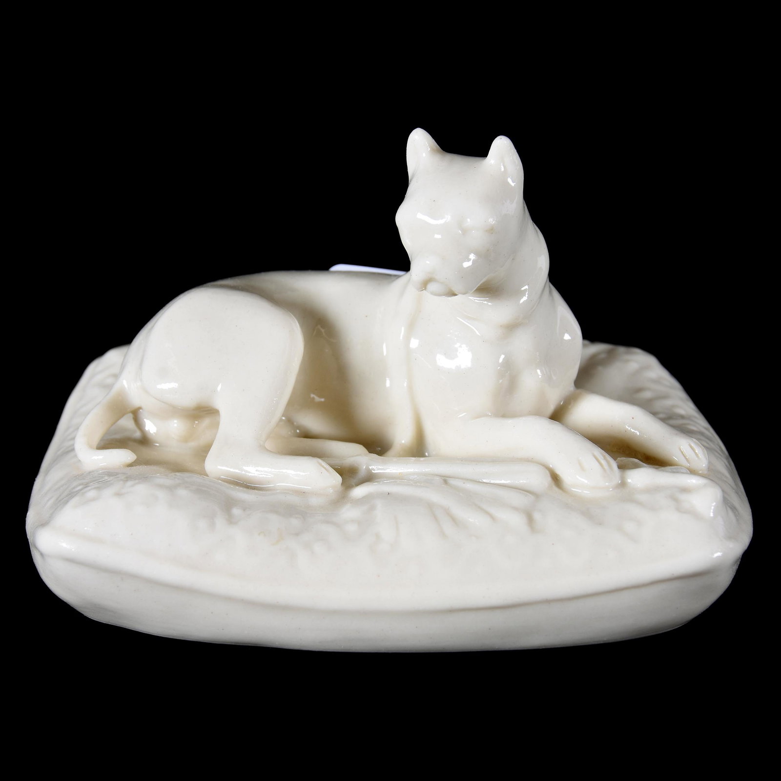 Boxer On Pillow, Irish Belleek Black Mark: Boxer on Pillow, Irish Belleek Black Mark, 3" x 5", from the estate of Ronald W. Prielipp PHD, Salina, KS. Ron was a professor of mathematics at Bethany College, Lindsborg, KS. Ron and his wife, Eliza