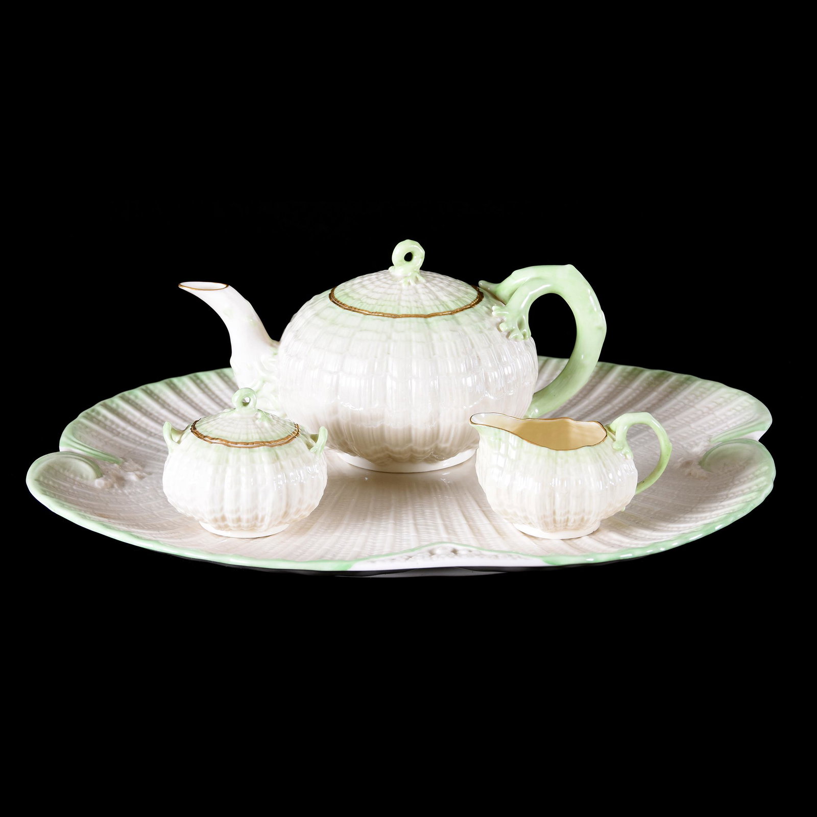 (4) Pc. Tea Set, Irish Belleek Black Mark Tridacna: (4) Pc. Tea Set, Irish Belleek Black Mark Tridacna, (1) 17" Serving Tray, (1) 5.25" x 9.5" Tea Pot, Creamer & Sugar, Fantastic Set, Green Highlights, from the estate of Ronald W. Prielipp PHD, Salina,