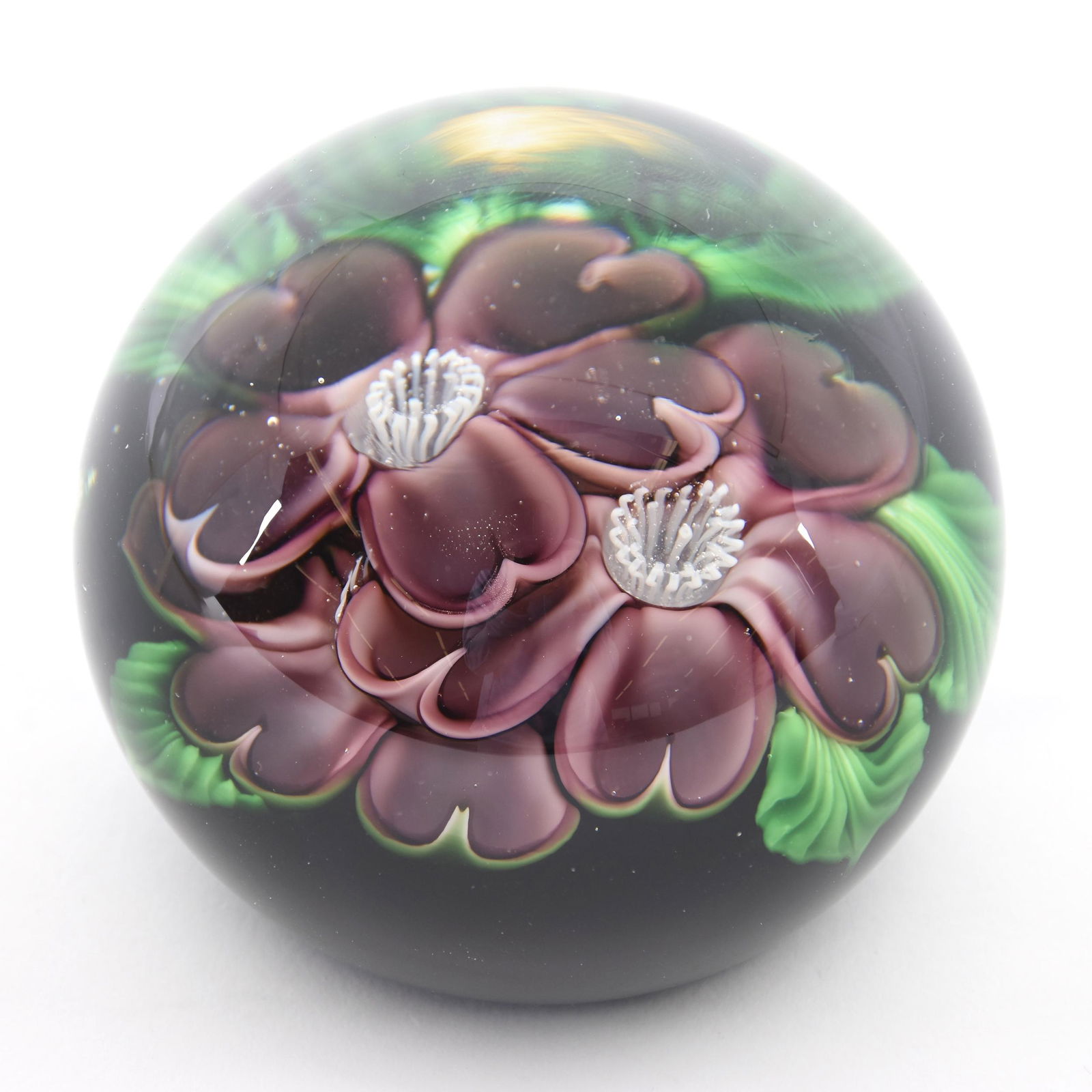 Paperweight Marked Orient & Flume Date 1984: Paperweight Signed Orient & Flume Dated 1984, 3" Diameter, Green Ground with Amethyst Floral Blossom Decor, Artist Signed "G. Held", from the estate of Ronald W. Prielipp PHD, Salina, KS. Ron was a pr