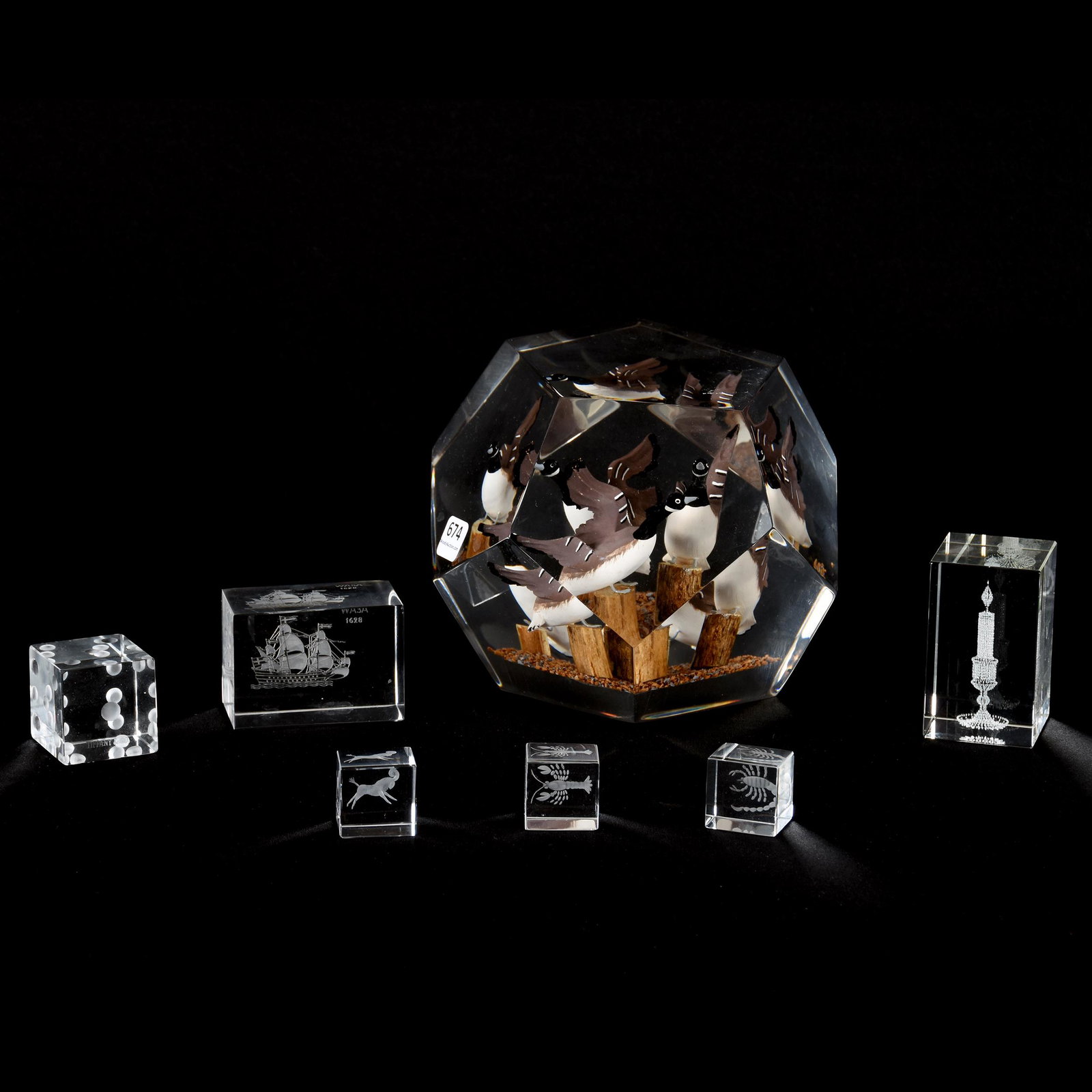 (7) Assorted Clear Weights: (7) Assorted Clear Weights, (1) 5.5" x 7" Canadian Geese on Stumps, Not Glass, (1) Signed Orrefors, Engraved Ship, (3) Zodiac Engraved Orrefors Cubes, (1) Signed Tiffany & Company Die, (1) Unmarked wi