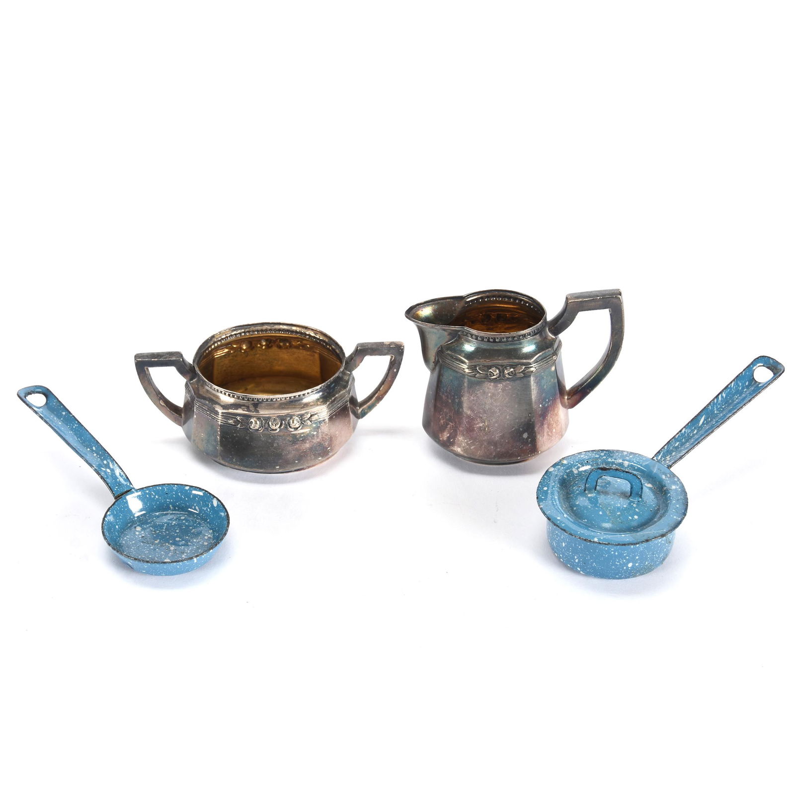 (4) Miniature Metal Items: (4) Miniature Metal Items, (1) 2.25" Creamer & Sugar Set Marked Alpaca, Silverplate, (1) 1" x 3.5" Blue Granite Ware Pan, Lid is Loose Fit, (1) 0.5" x 3.25" Blue Granite Ware Skillet, (1) Extra 1.5" D