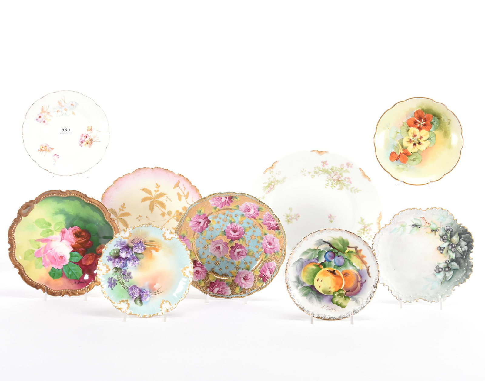 (9) Assorted Plates, Prussia Style & Other: (9) Assorted Plates, Prussia Style & Other, (1) 9.5" Haviland Limoges, White with Floral, (1) 8" A.K. Limoges, Pink and Cream with Gold Leaf Decor, (1) 7.5" Nippon Style, Blue and Gold with Pink Rose 