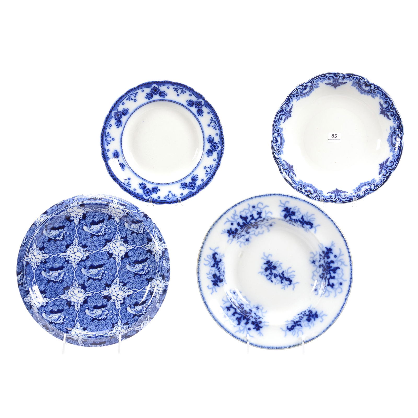 (4) Assorted Flow Blue Items: (4) Assorted Flow Blue Items, (1) 9" Bowl, Glady's Pattern by New Wharf, (1) 8.5" Soup Bowl, Belmont Pattern by F and Sons, (1) 10.5" Underplate, Unmarked, Complete Floral Coverage, (1) 10.5" Soup Bow