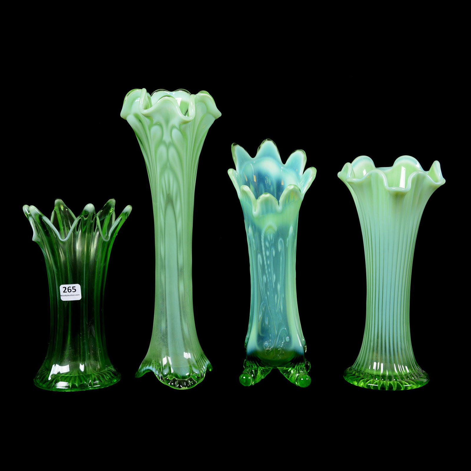 (4) Green Opalescent Pattern Glass Vases: (4) Green Opalescent Pattern Glass Vases Including: (1) 11.5" Tokyo Pattern, (1) 10.5" Inverted Fan and Feather Pattern, Footed Whimsey, Small Chip on Foot (1) 9.5" Fine Rib Pattern, (1) 8" Dugan's Wi