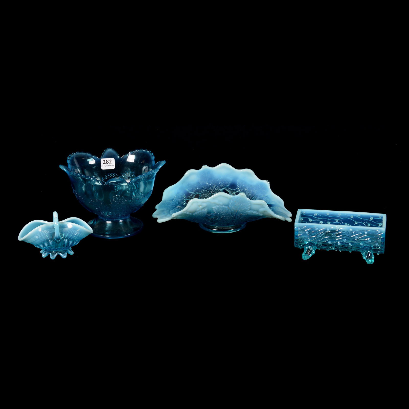(4) Blue Pattern Glass Items: (4) Blue Pattern Glass Items, (1) 4.5" X 6.5" Daisy Intaglio Footed Bowl, (1) 3" X 8.75" Autumn Leaves Folded Dish, Blue Opalescent (1) 5" Town Pump Trough, Blue Opalescent, Foot Chips, (1) 2.5" X 4.2