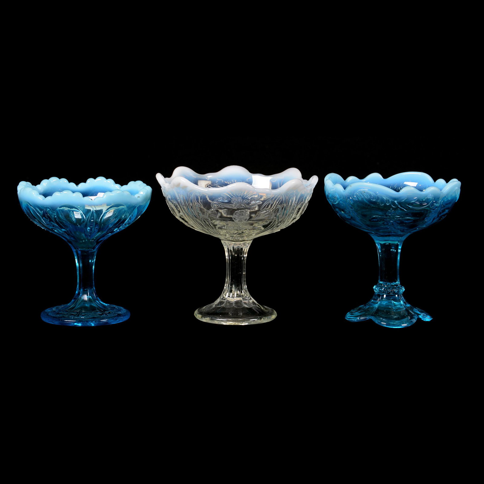 (3) Opalescent Pattern Glass Compotes: (3) Opalescent Pattern Glass Compotes, (1) 5.25" X 5.5" Everglades Pattern, White Opalescent, (1) 5" X 4.5" Intaglio Pattern, Blue Opalescent (1) 4.5" X 4.5" Iris and Meander, Blue Opalescent, Private