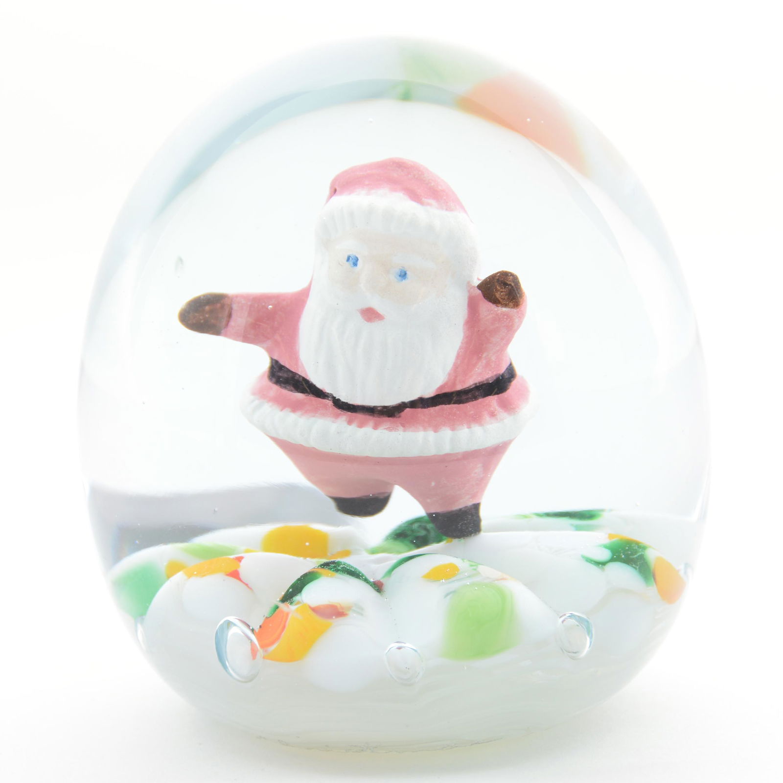 Paperweight "The Magic of Glass by Jim Davis 1980": Paperweight "The Magic of Glass by Jim Davis 1980", 3" Height, Egg Form, Santa Claus Figure on White, Green and Yellow Mottled Ground, also Marked "Christmas 1980, #18 Made for Statesman", Estate of V